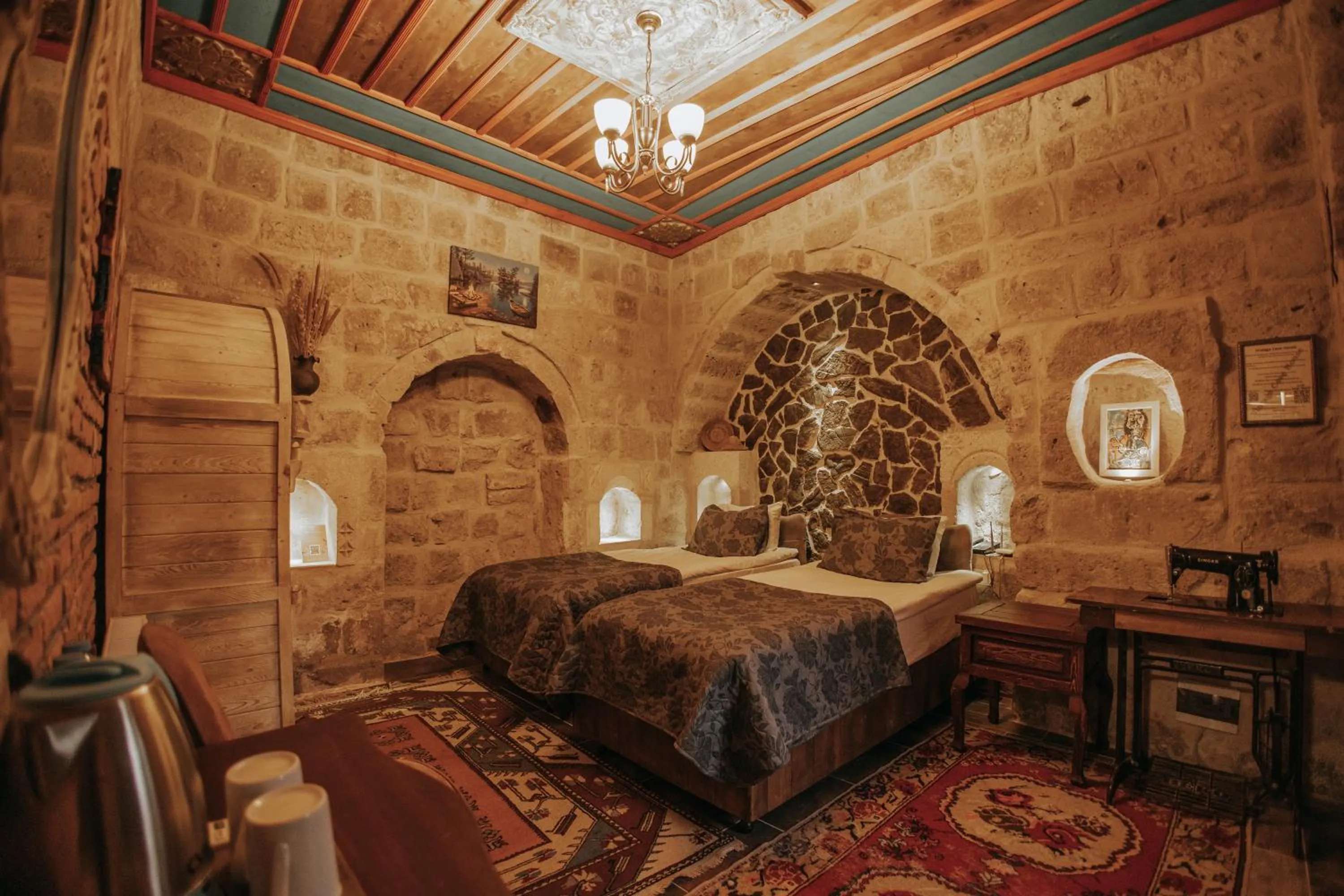 Bed in Vintage Cave House Hotel