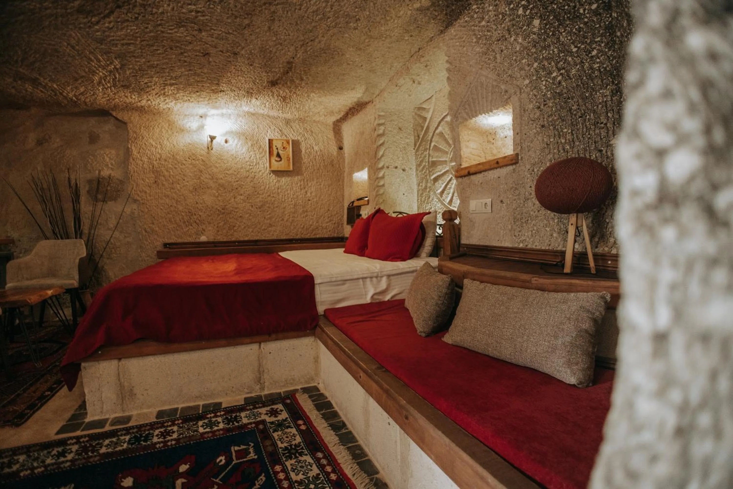 Bed in Vintage Cave House Hotel