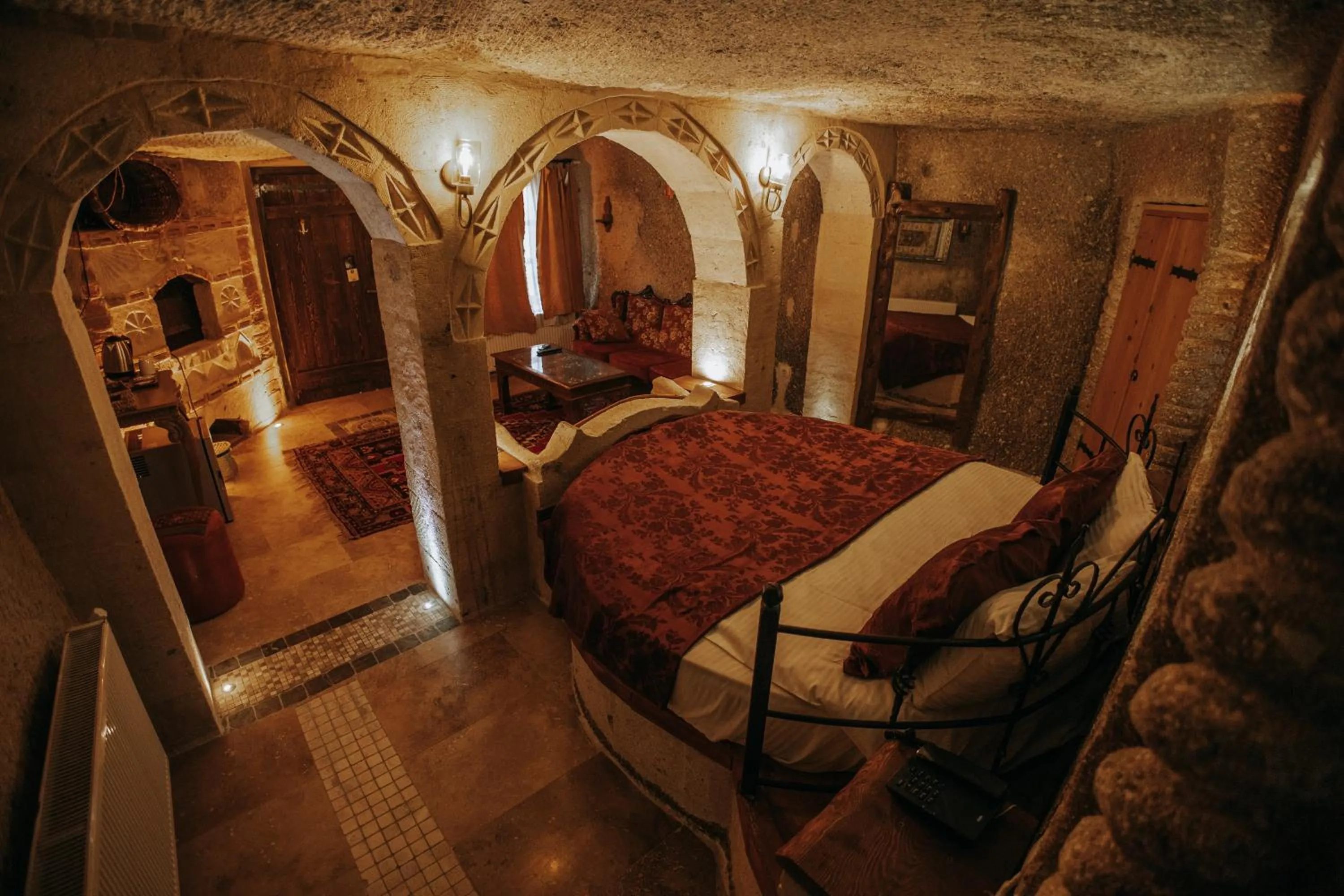 Bed in Vintage Cave House Hotel