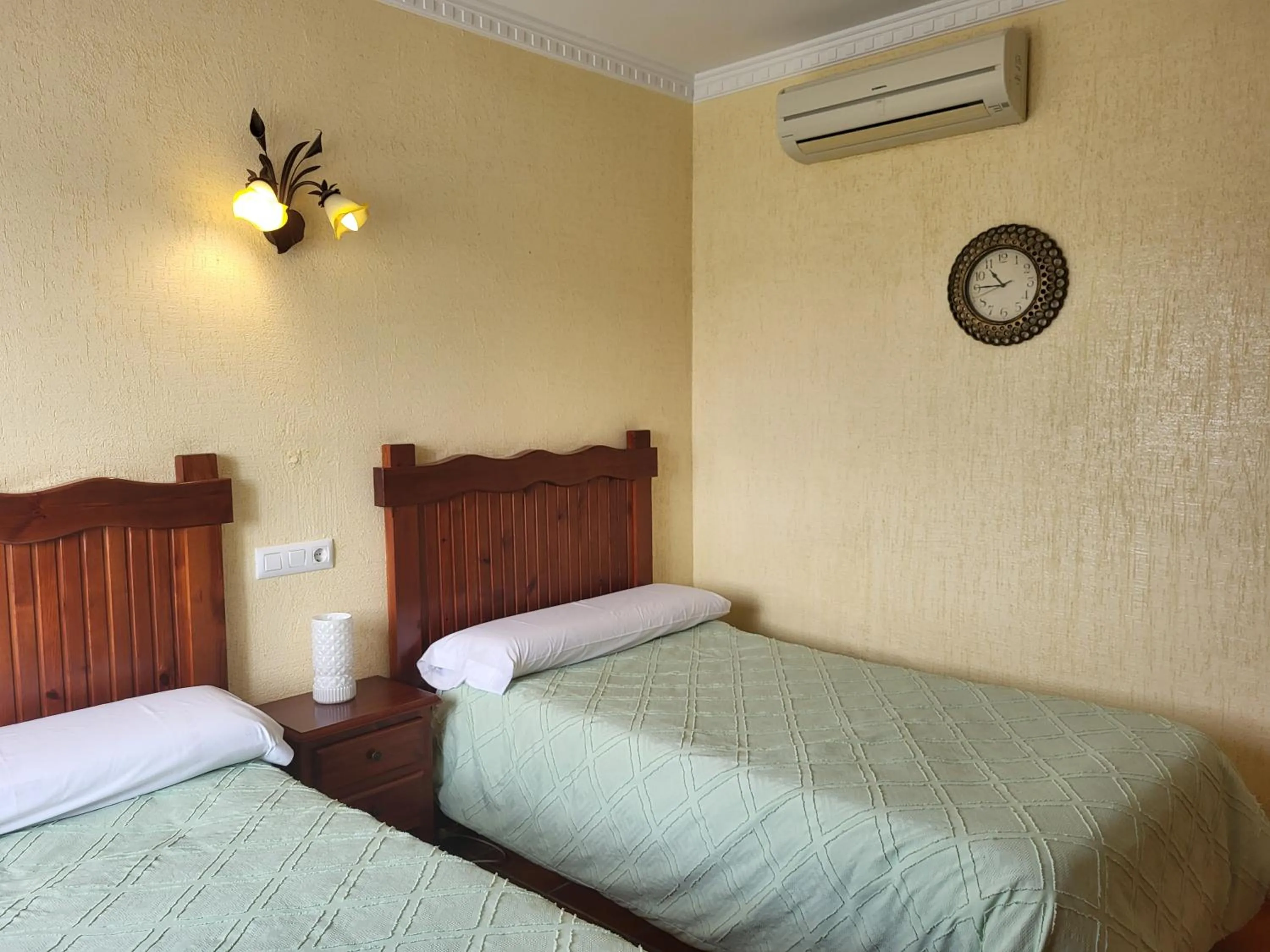 Photo of the whole room, Bed in Hostal Rural La Plata Parking Incluido