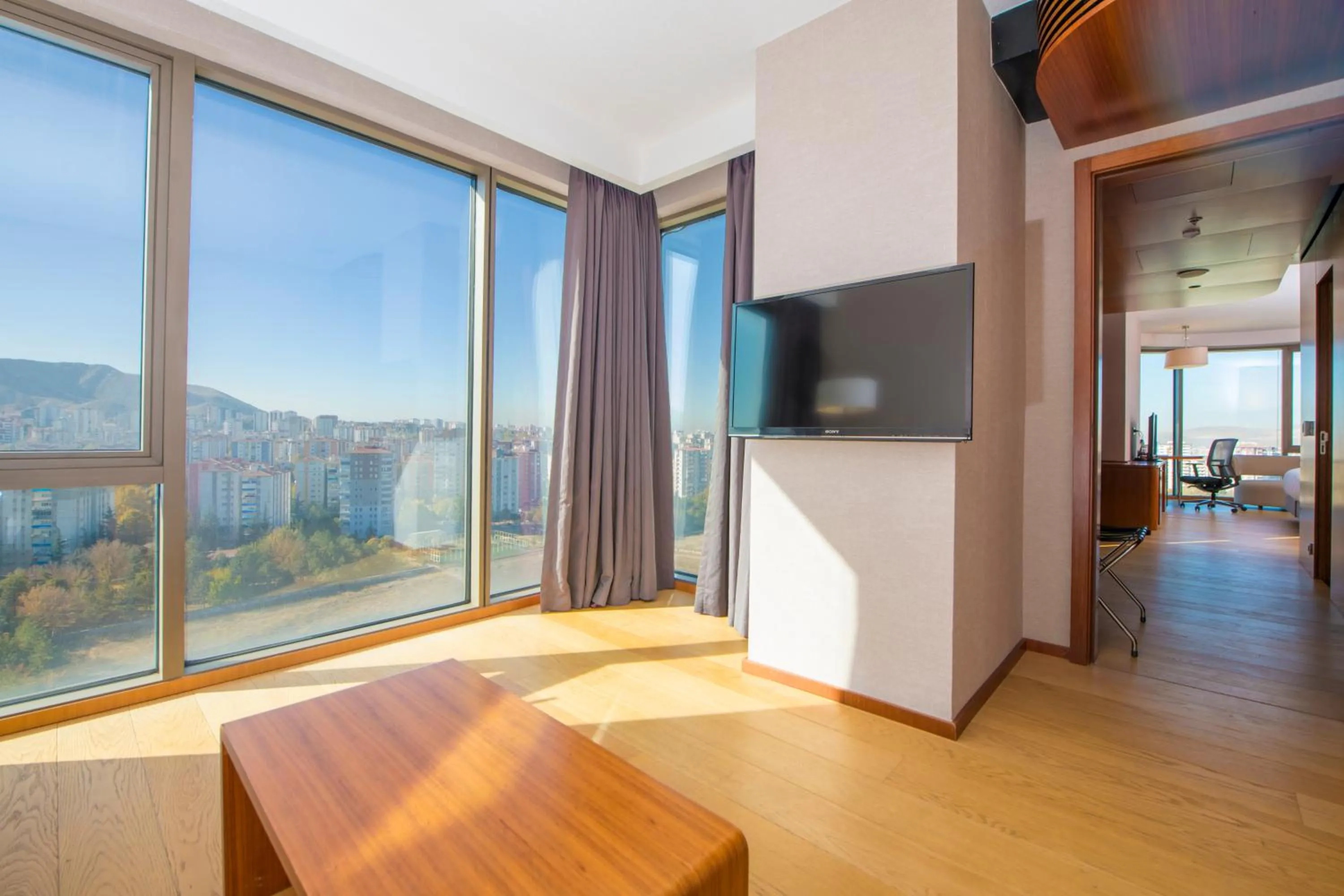 Communal lounge/ TV room in Crowne Plaza Kayseri by IHG