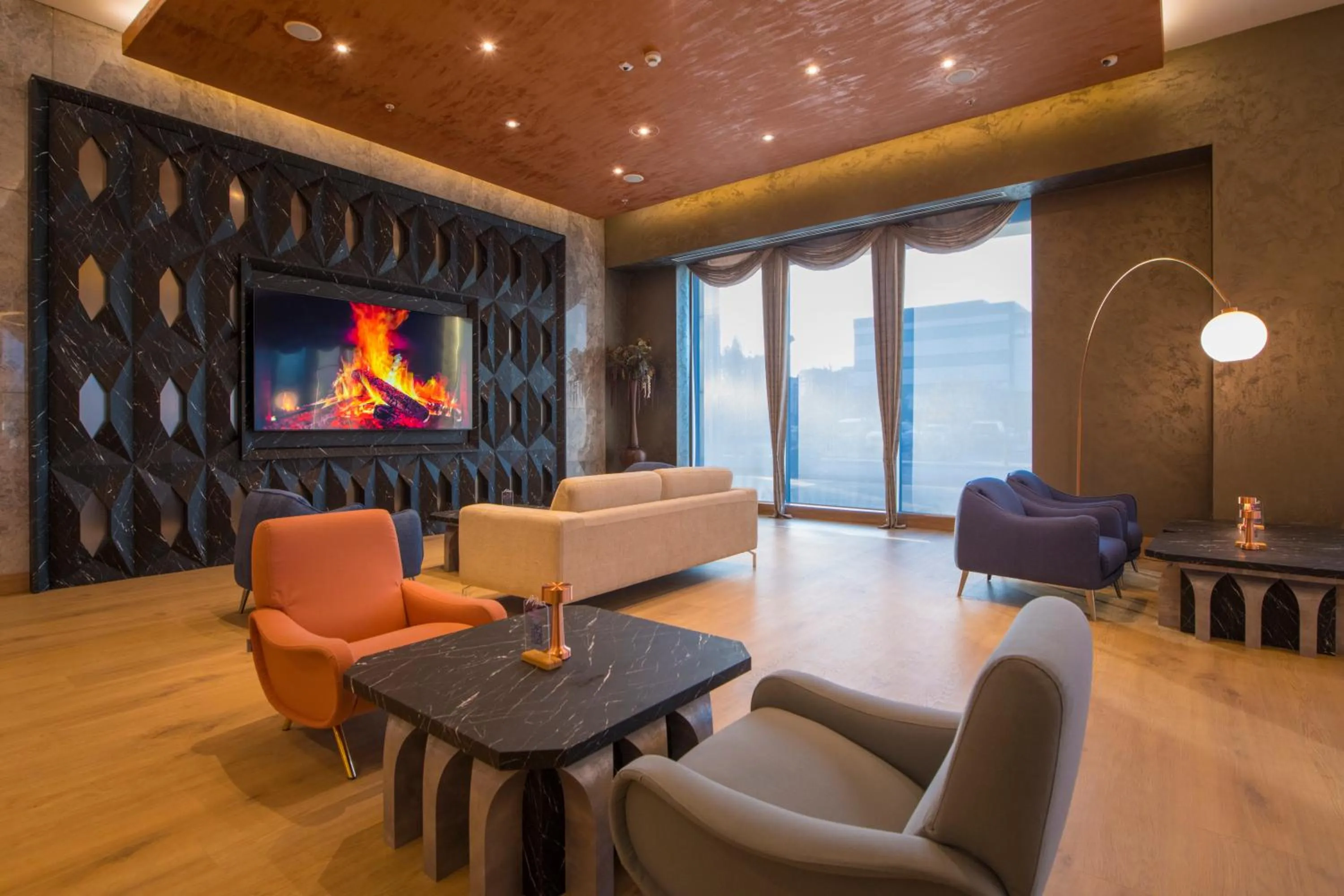 Communal lounge/ TV room in Crowne Plaza Kayseri by IHG