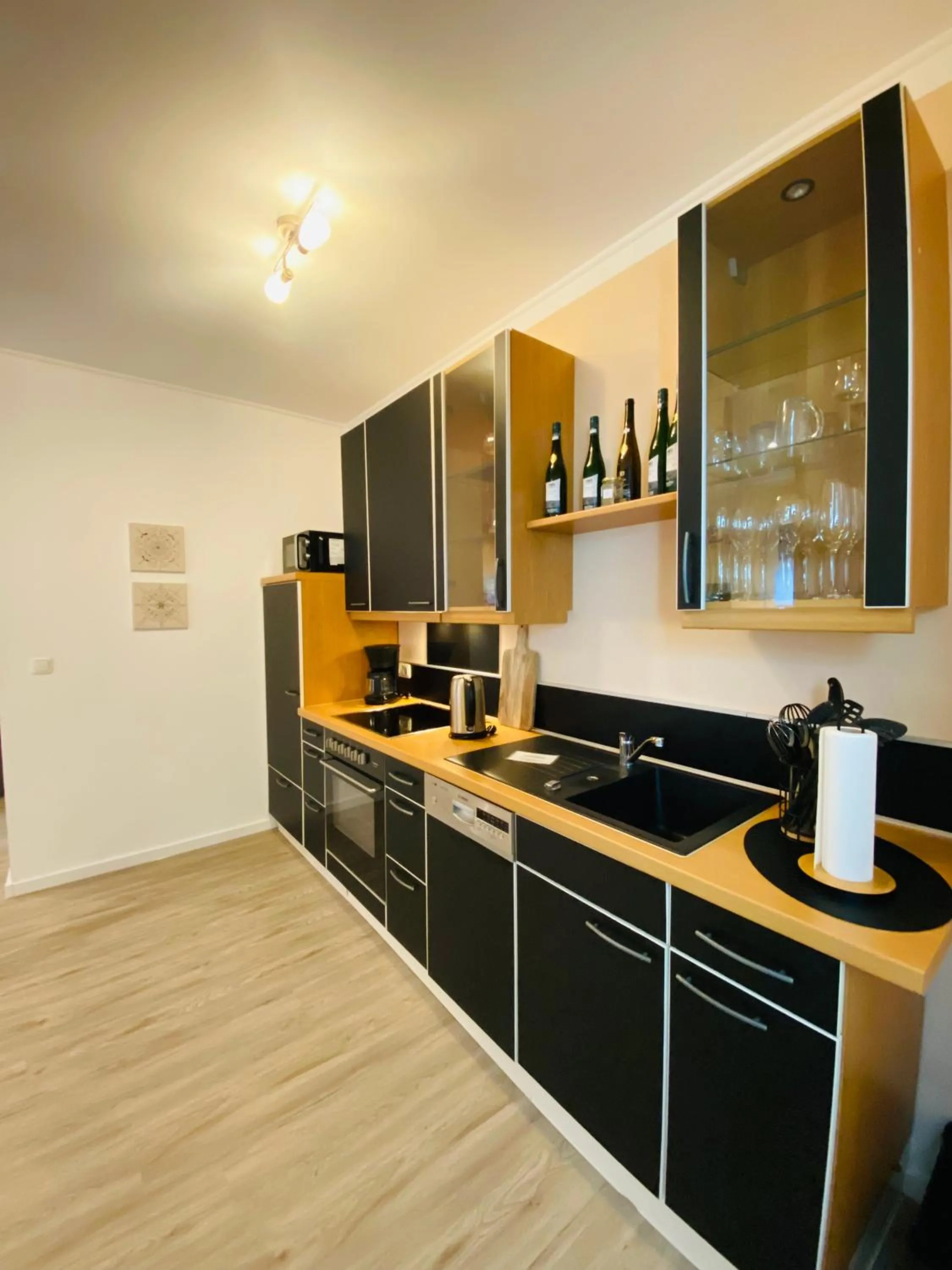 Kitchen or kitchenette in Ferienwohnung Ambiente