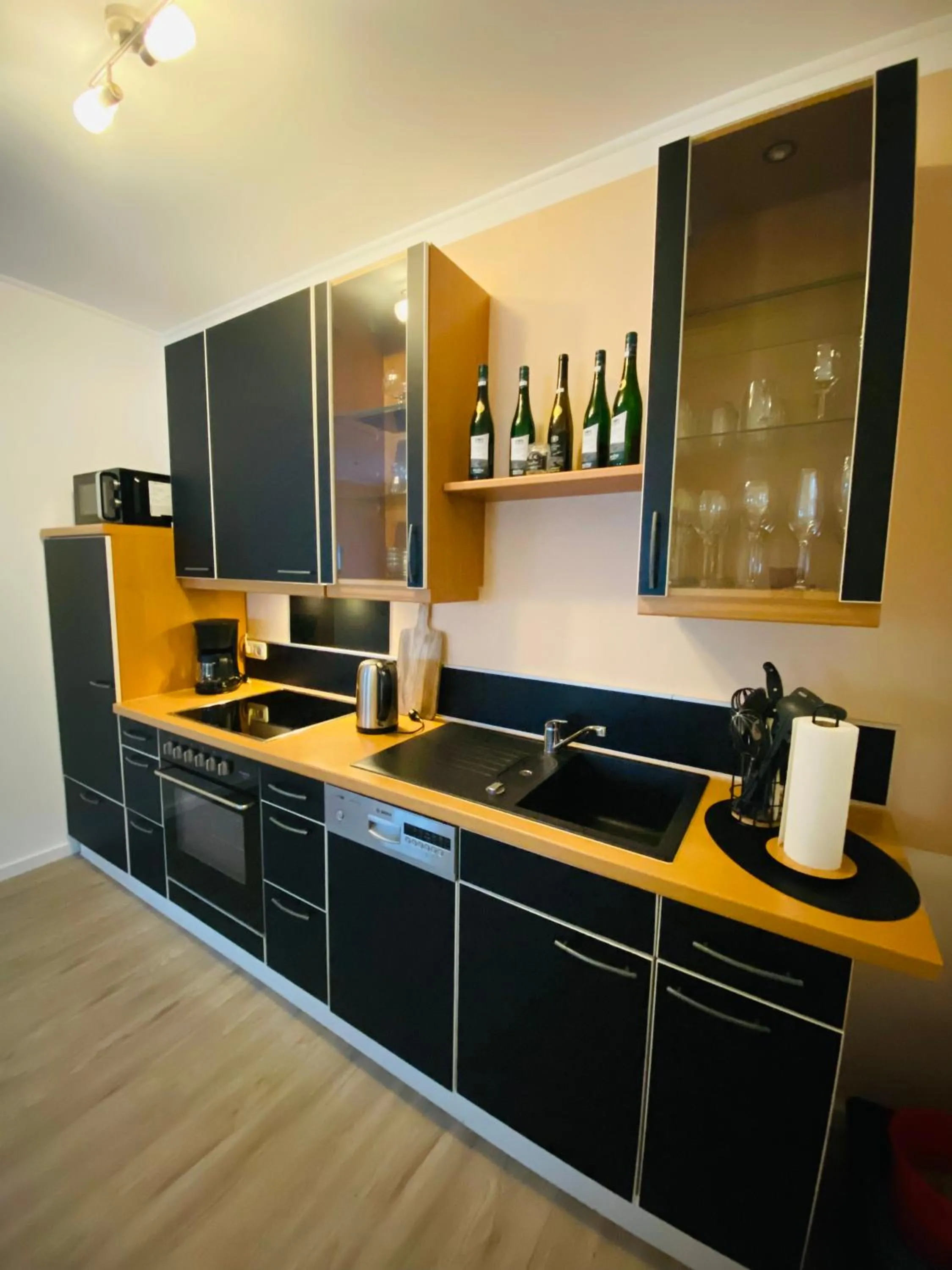 Kitchen or kitchenette in Ferienwohnung Ambiente