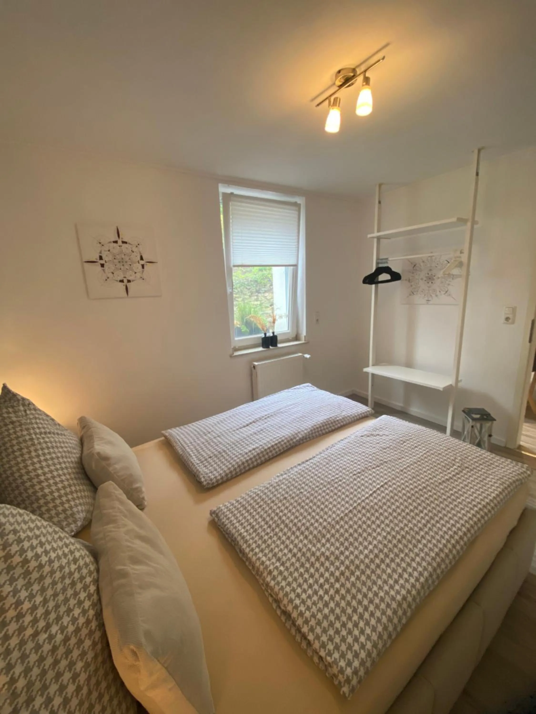 Bed in Ferienwohnung Ambiente