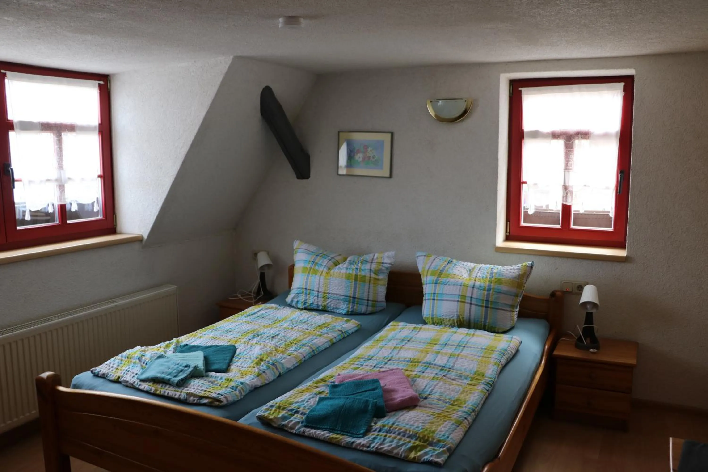 Photo of the whole room, Bed in Gasthaus Zur Weintraube