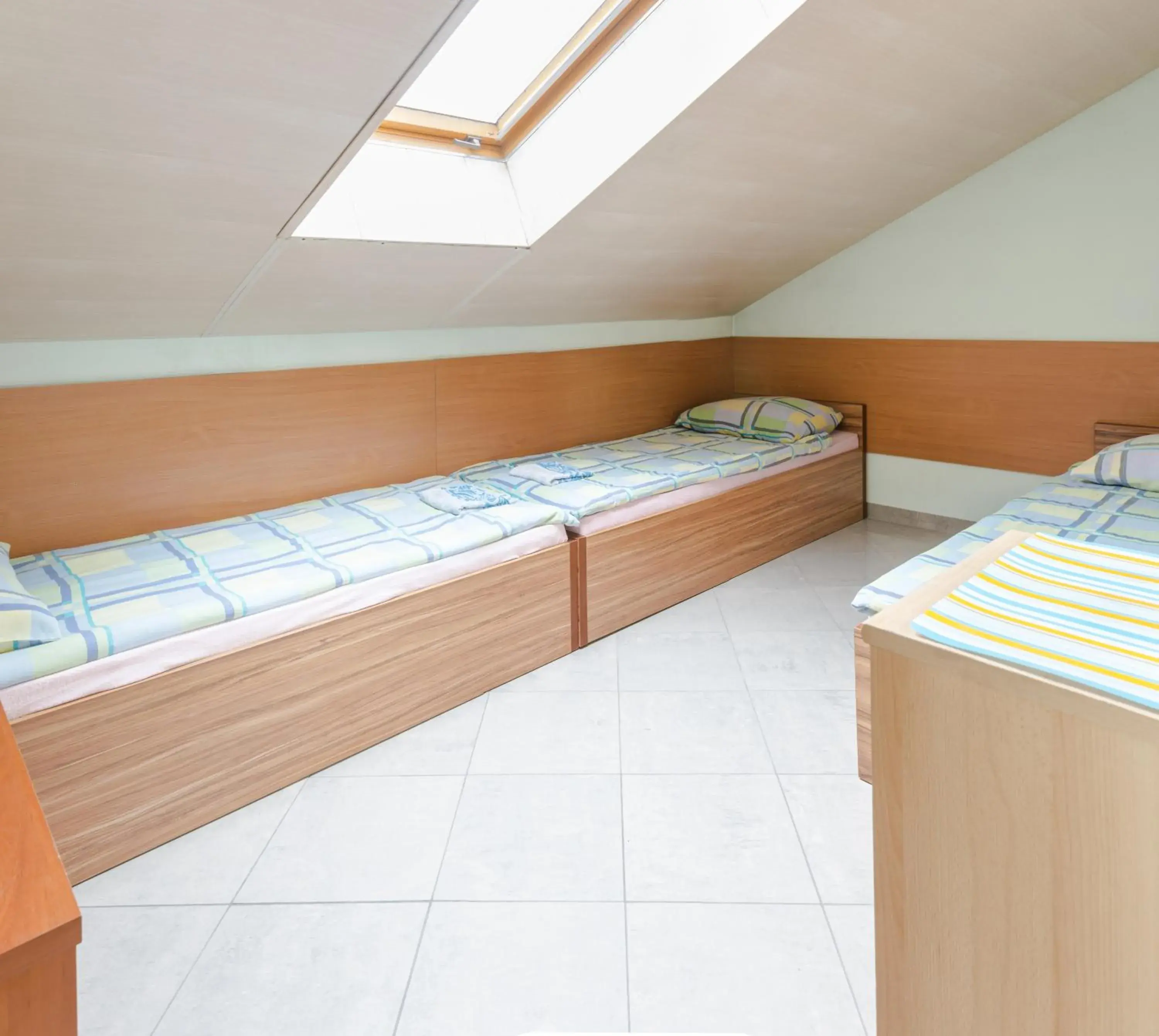 Basic Triple Room with Shared Bathroom in Adeo Hostel Basic Triple Room with Shared Bathroom in Adeo Hostel