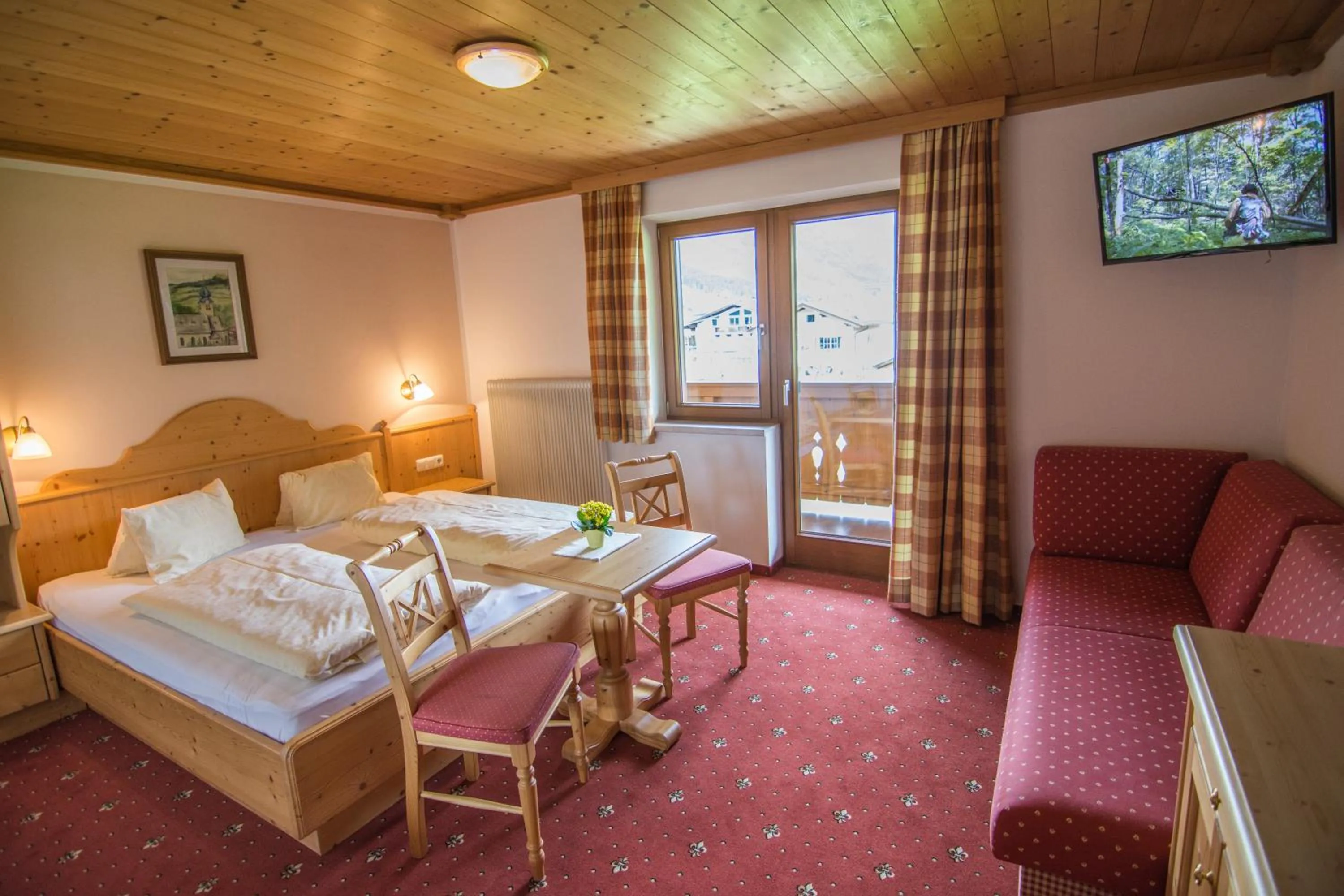 Seating area, Bed in Frühstückspension Samerhof