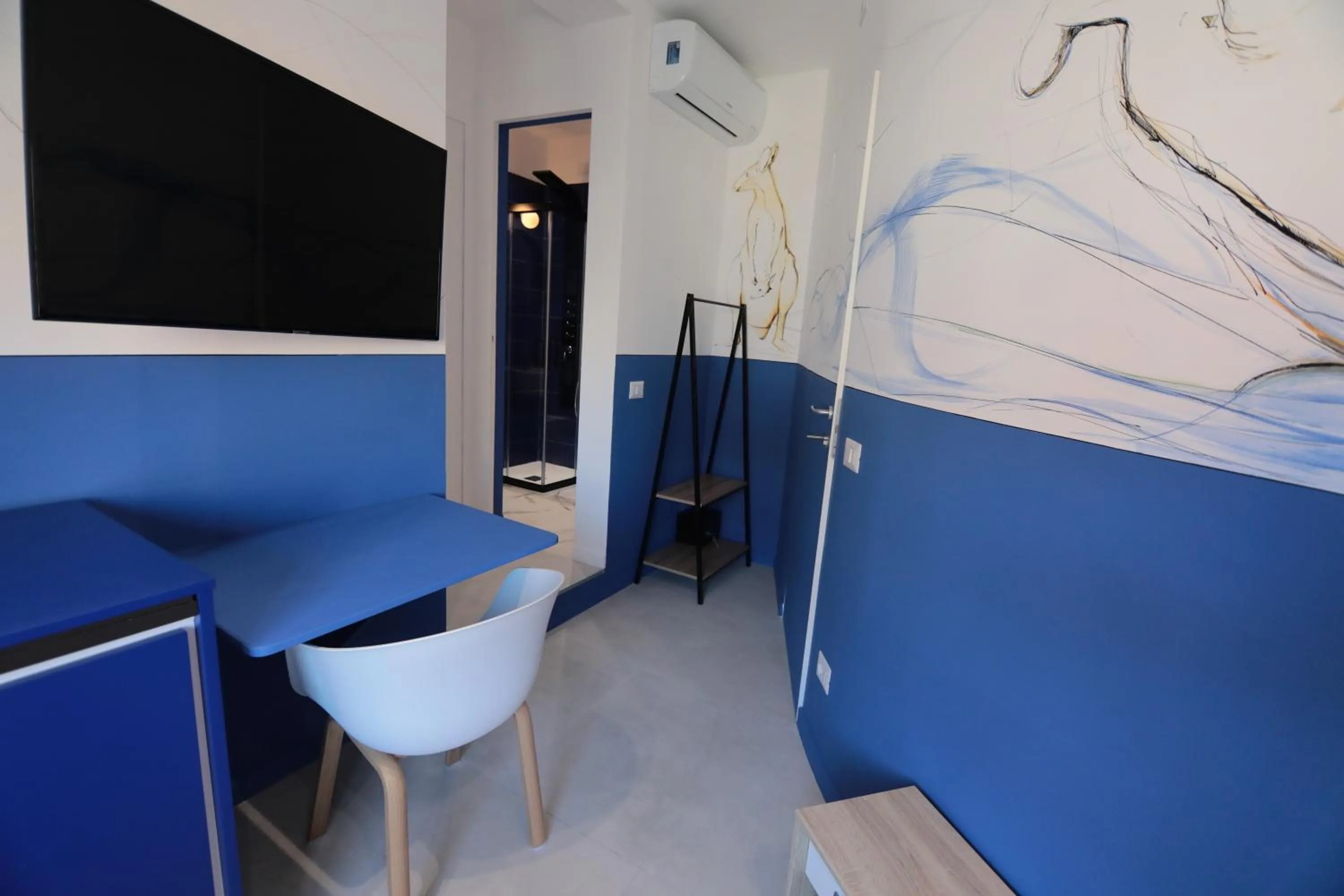 Living room in O.Effe. Suites / Vatican