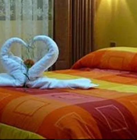 Bed in Hotel Inkayra