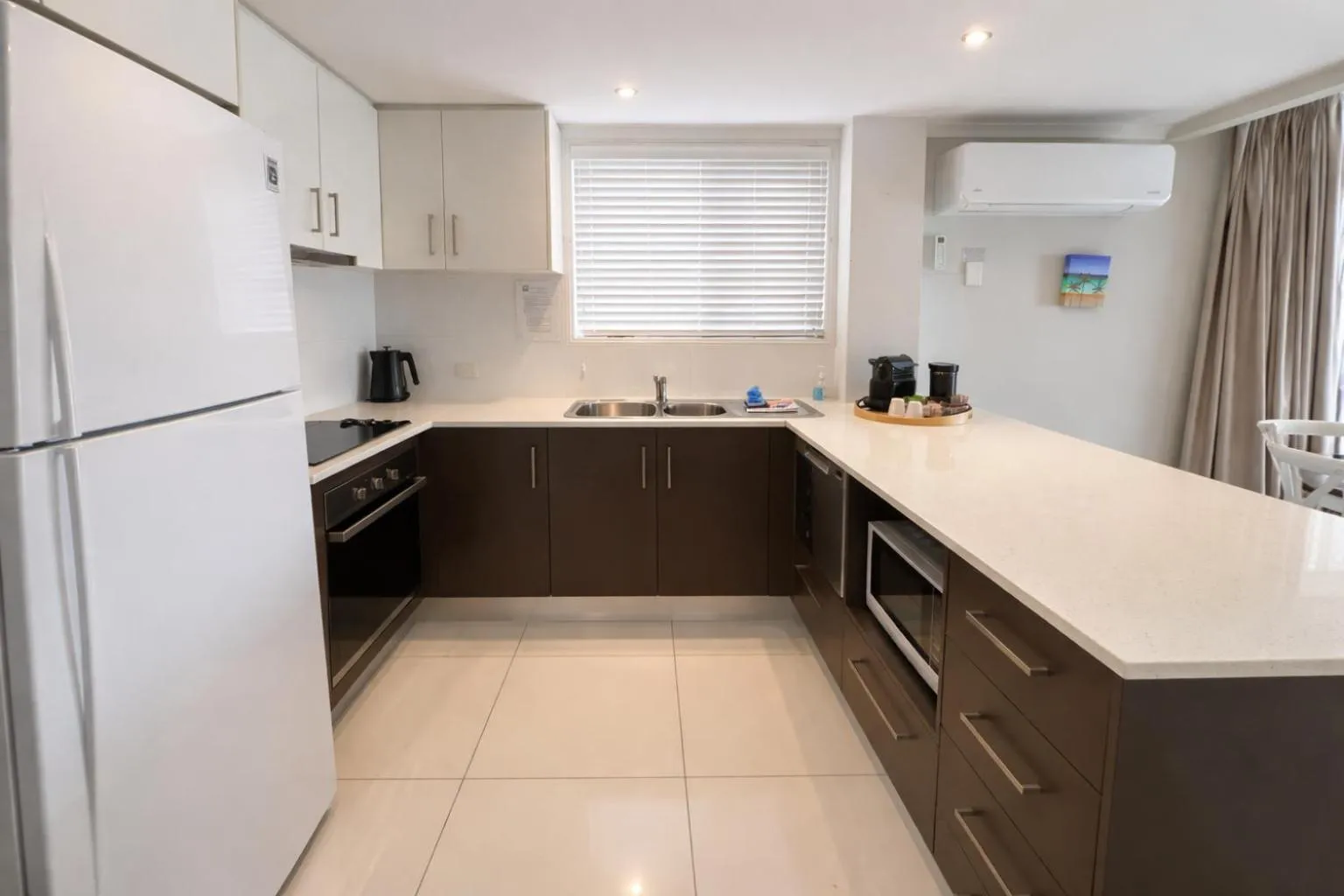 Kitchen or kitchenette in Saltwater Villas - Pet Friendly Accommodation