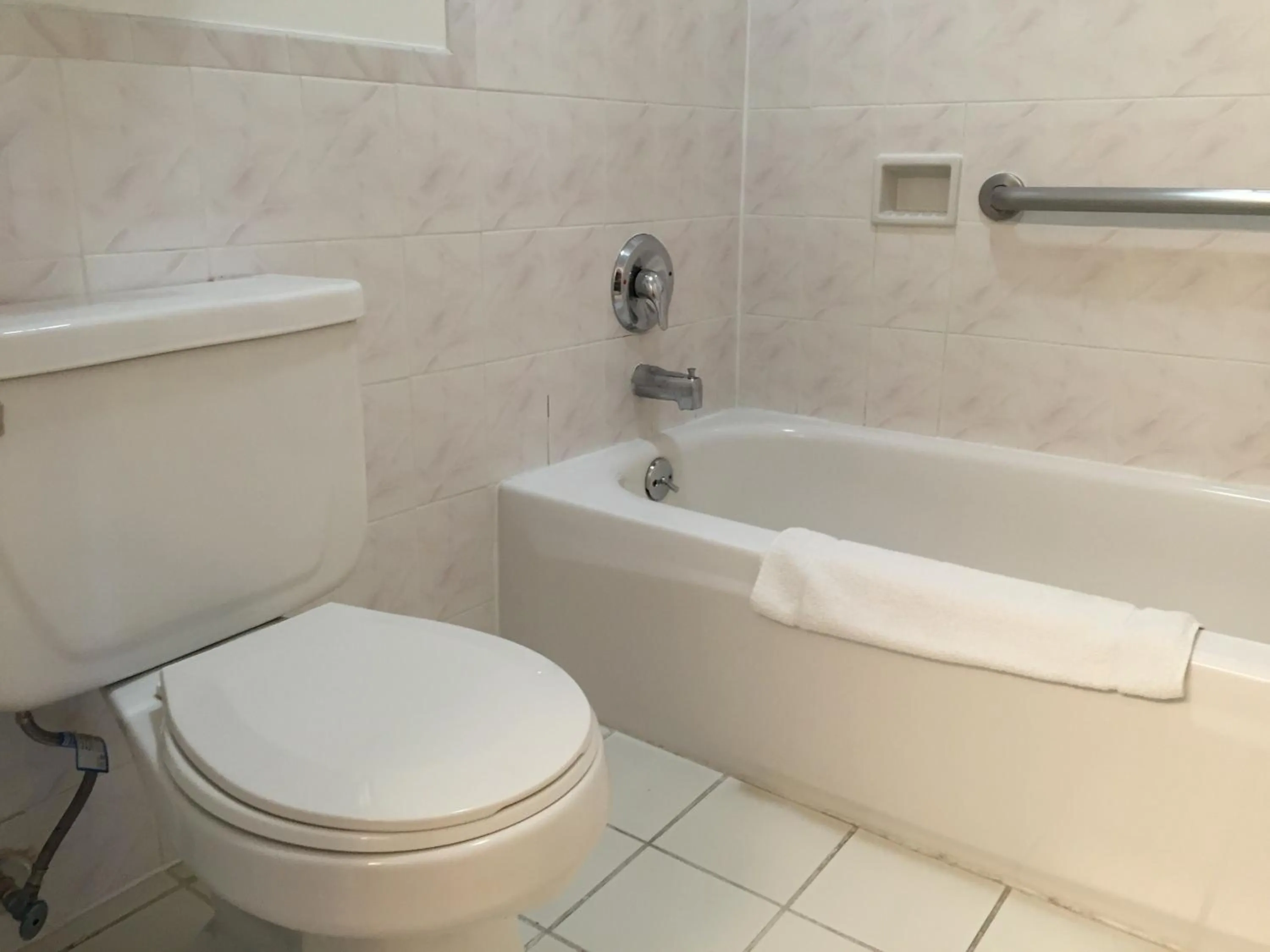 Toilet in Regency Inn at San Francisco Airport