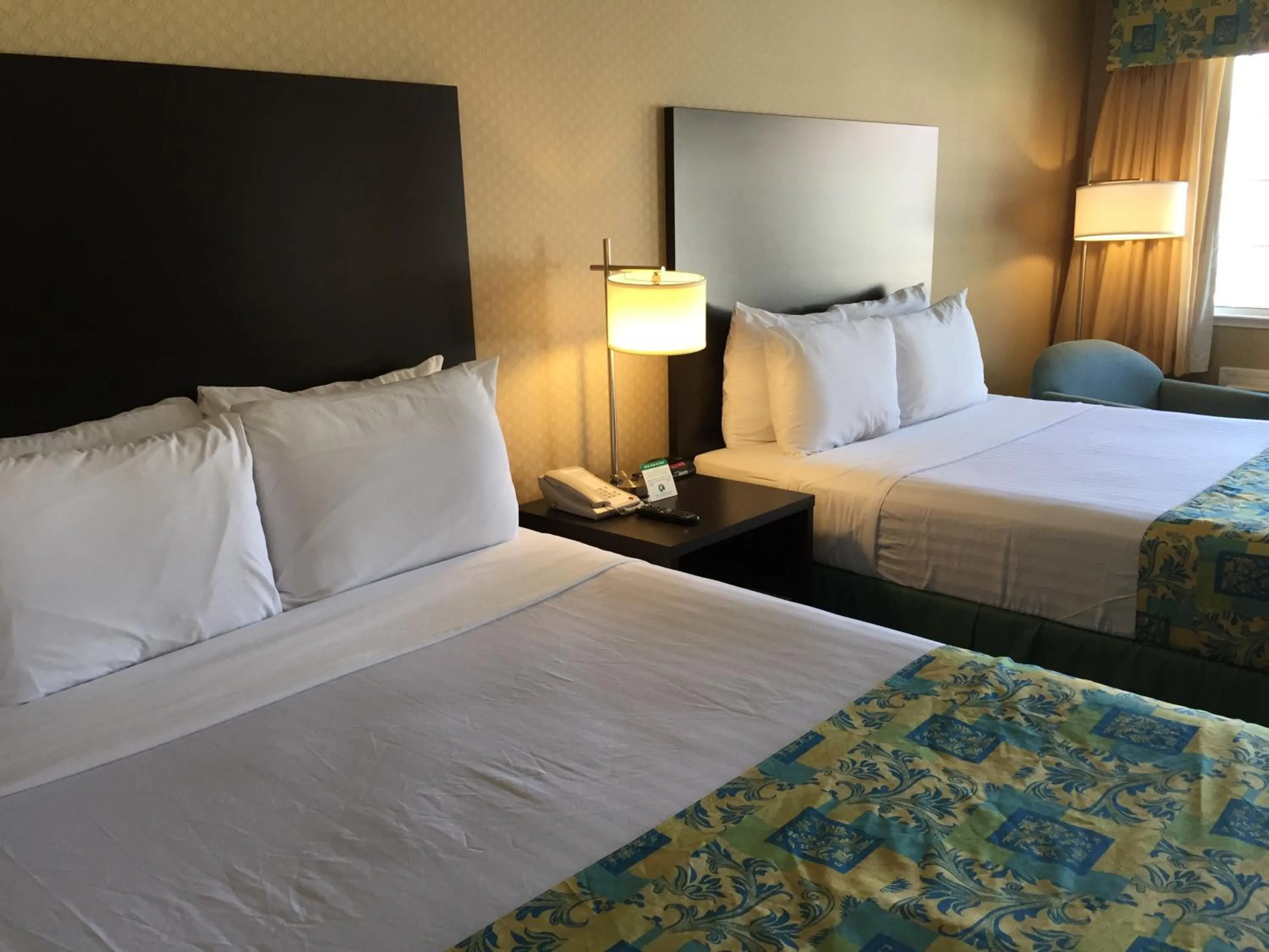 Bed in Regency Inn at San Francisco Airport