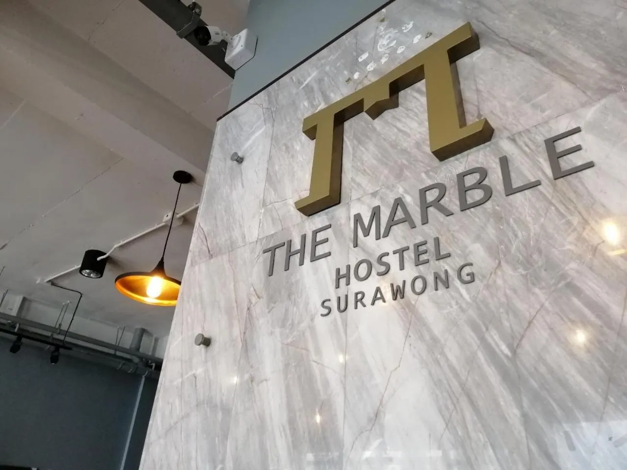 Property logo or sign in The Marble Hostel