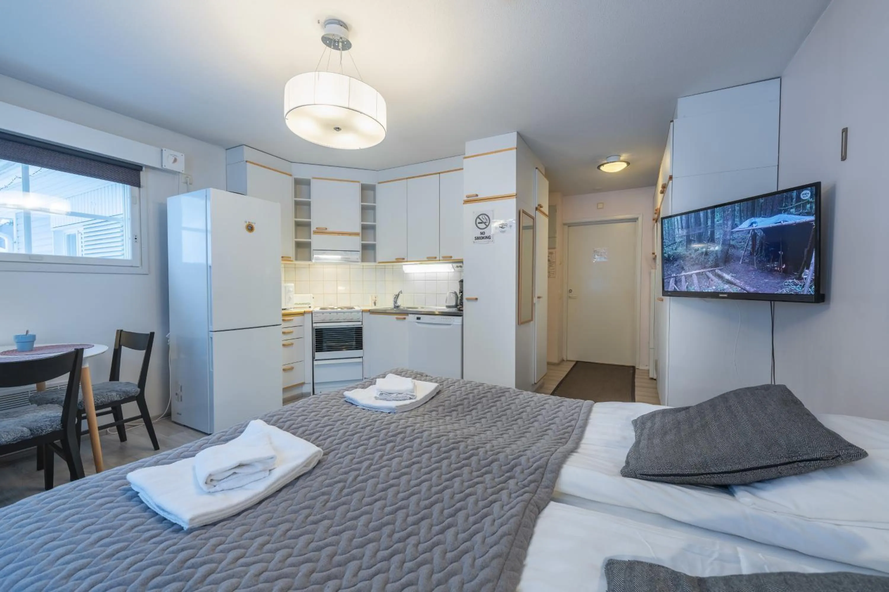 Bed in Kuukkeli Apartments