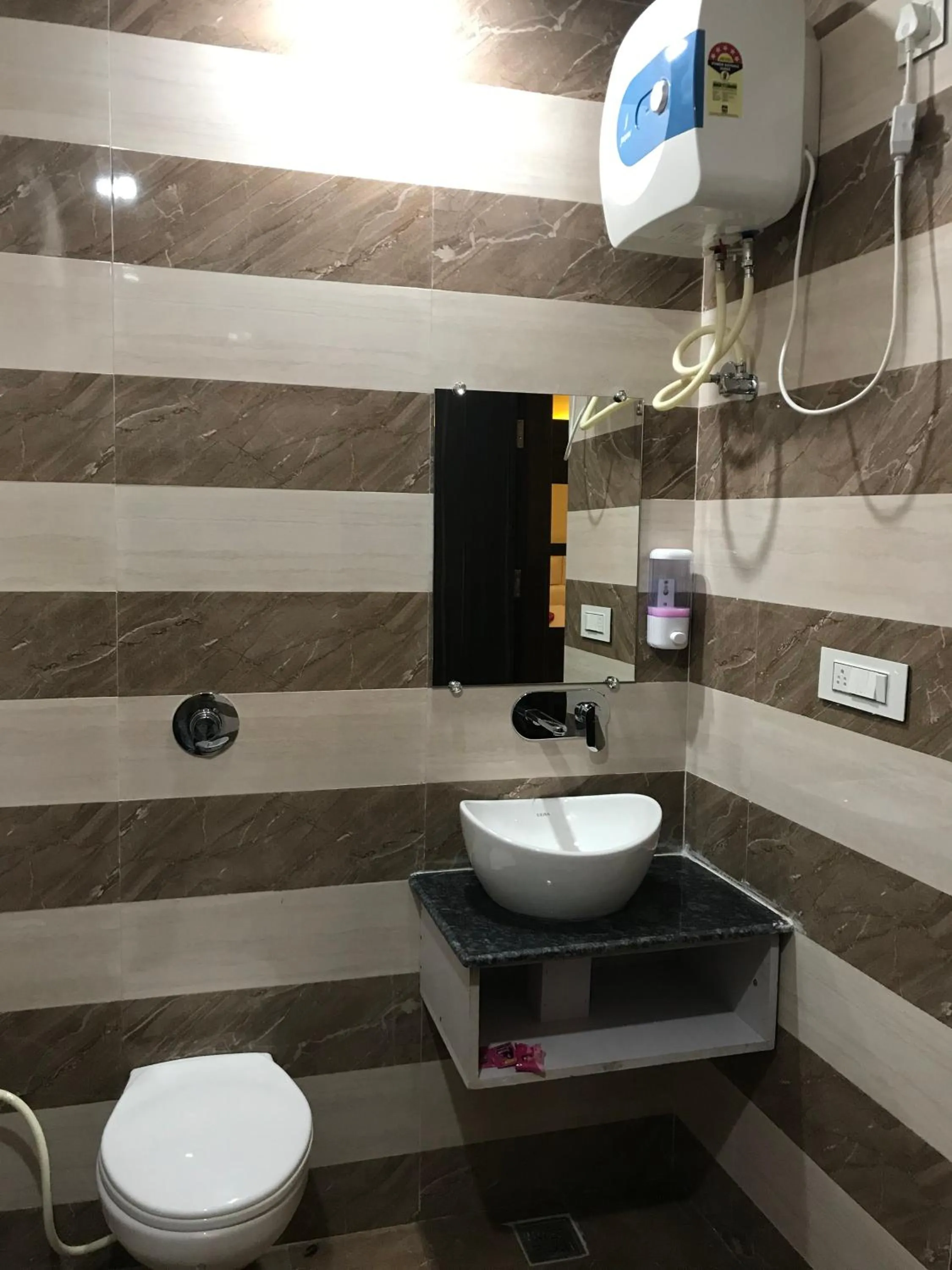 Bathroom in Hotel Kabir Residency