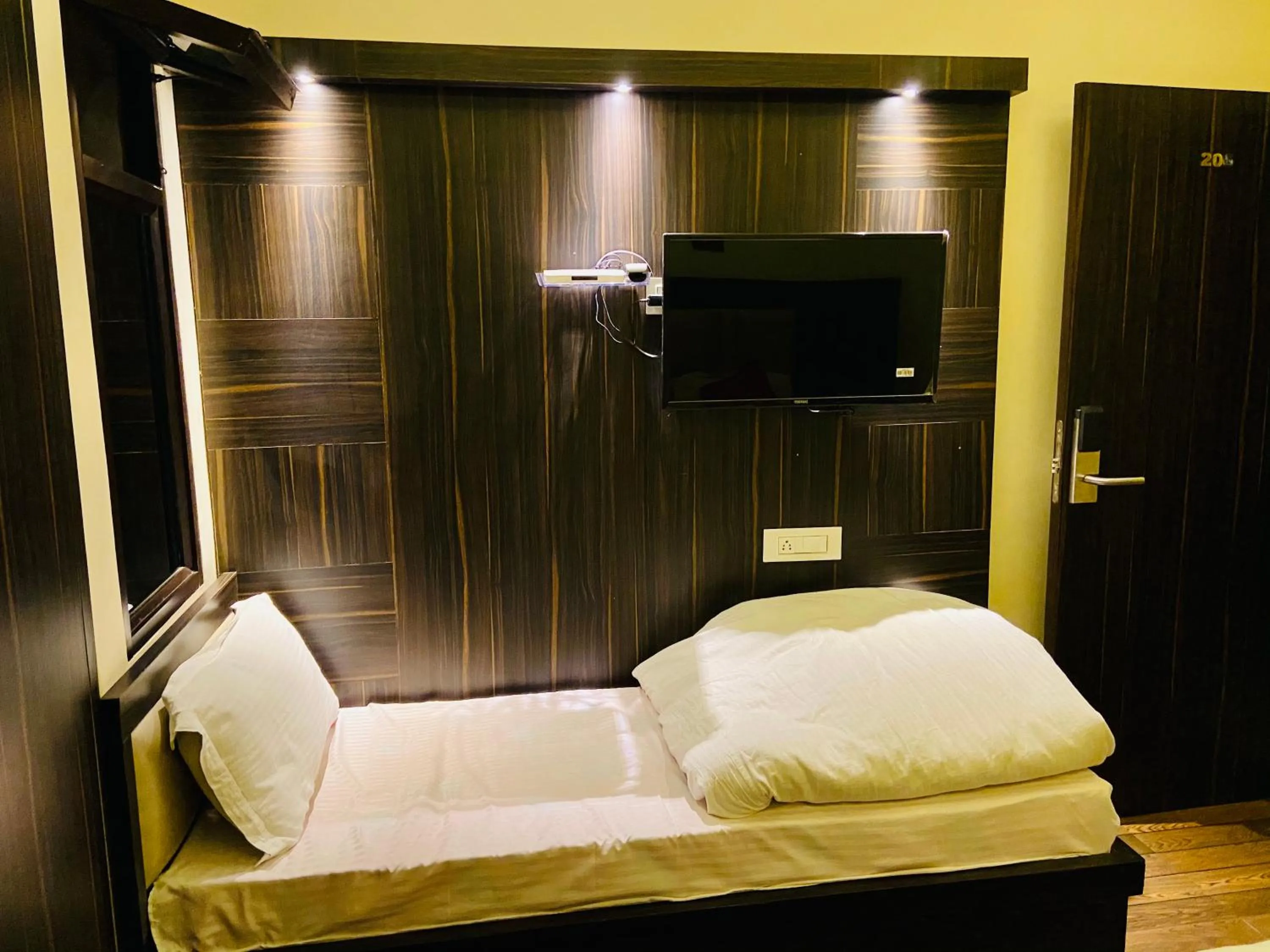 Bed in Hotel Kabir Residency