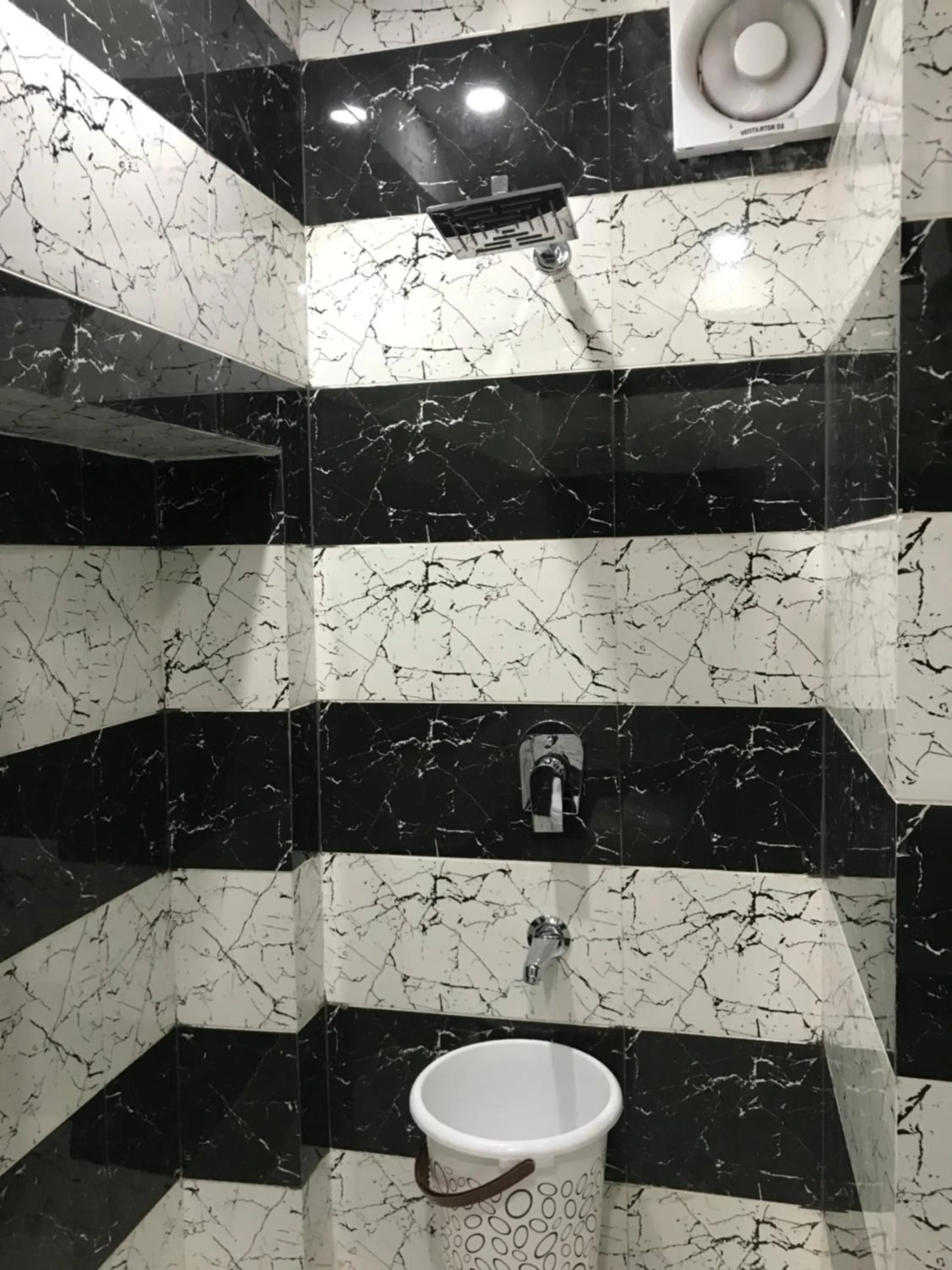 Bathroom in Hotel Kabir Residency
