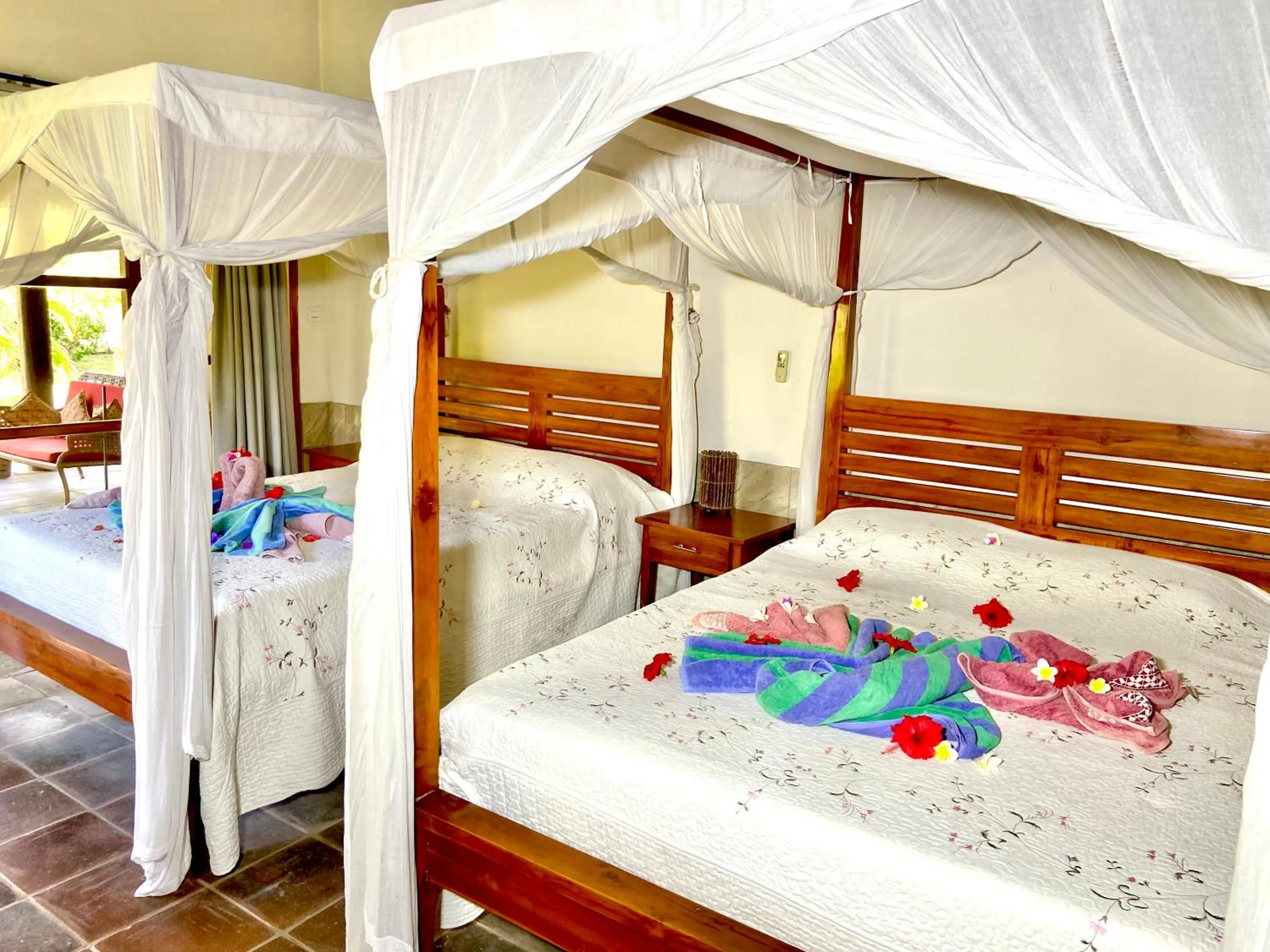 Bed in Sunia Loka Bungalows & Dive Center