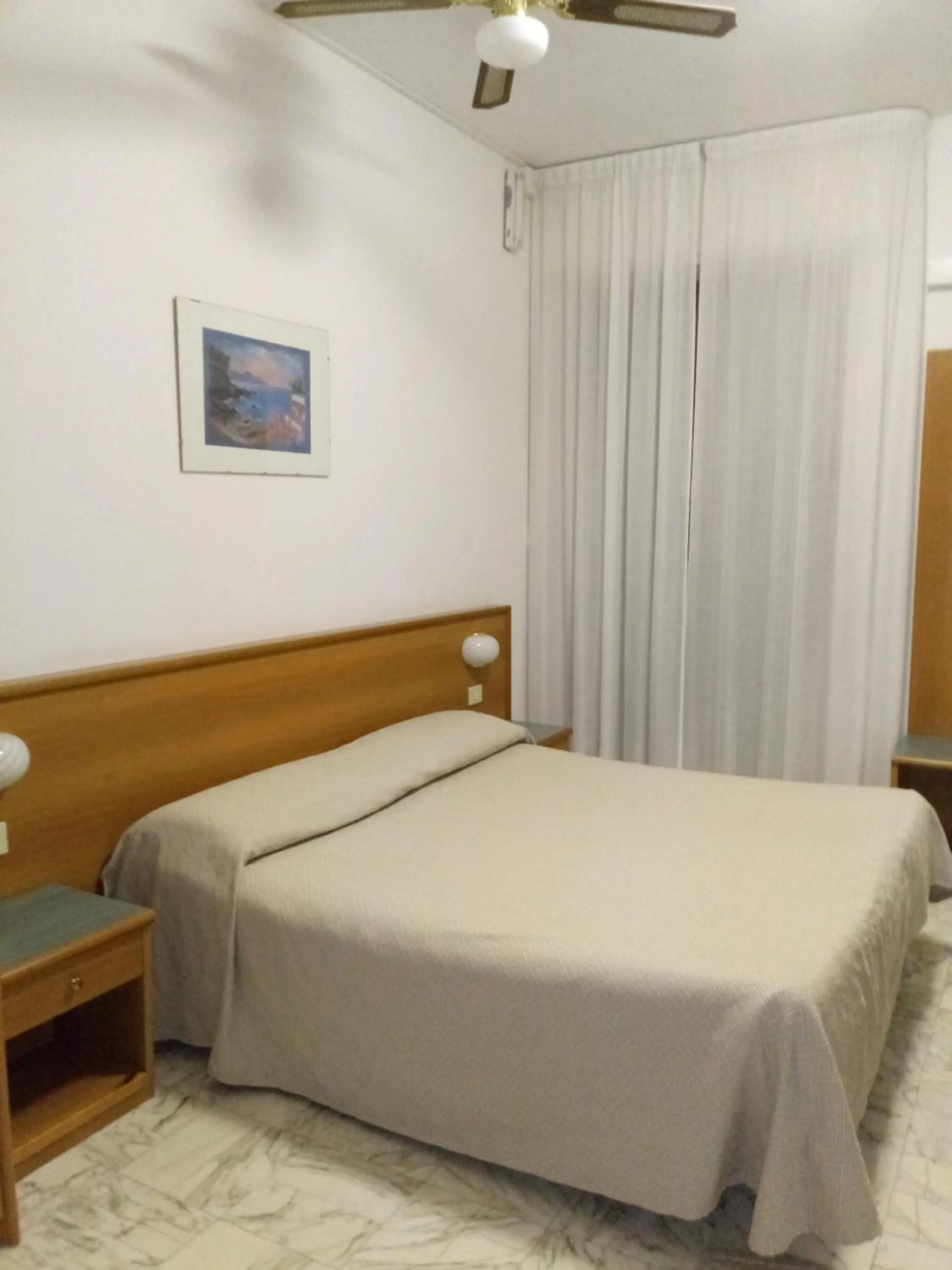 Bed in Hotel Valentino