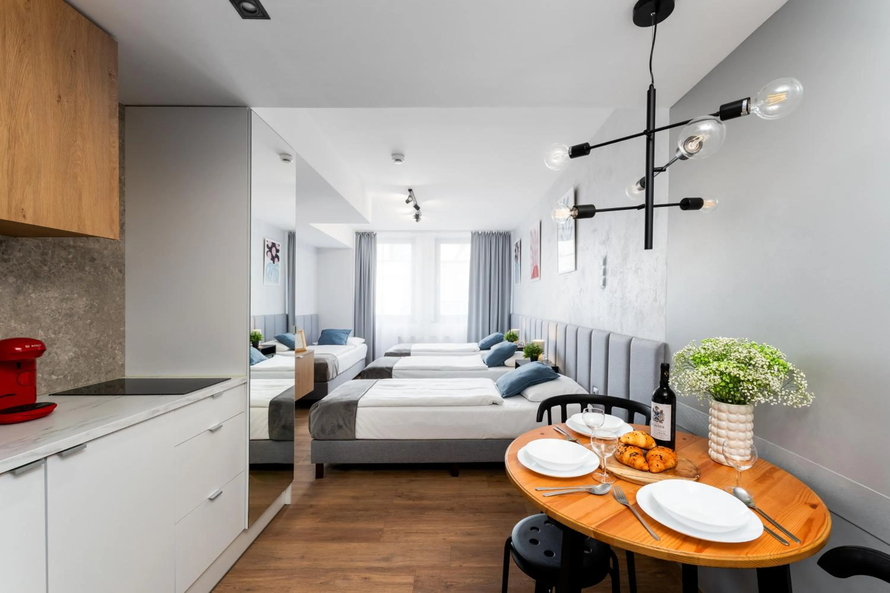 Kitchen or kitchenette, Bed in Szewska 7 Apartments