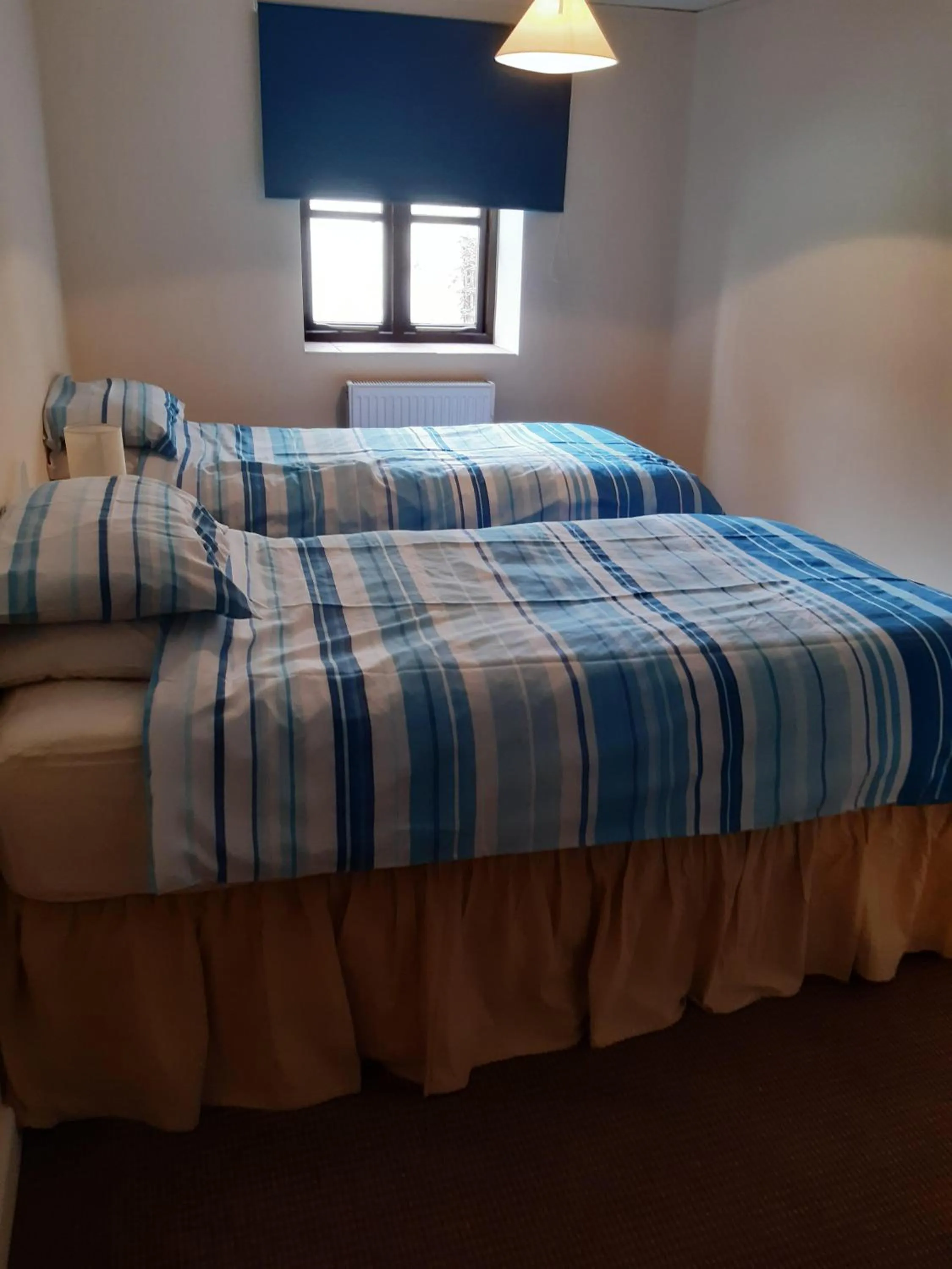 Bedroom in The Rampant Horse Public House