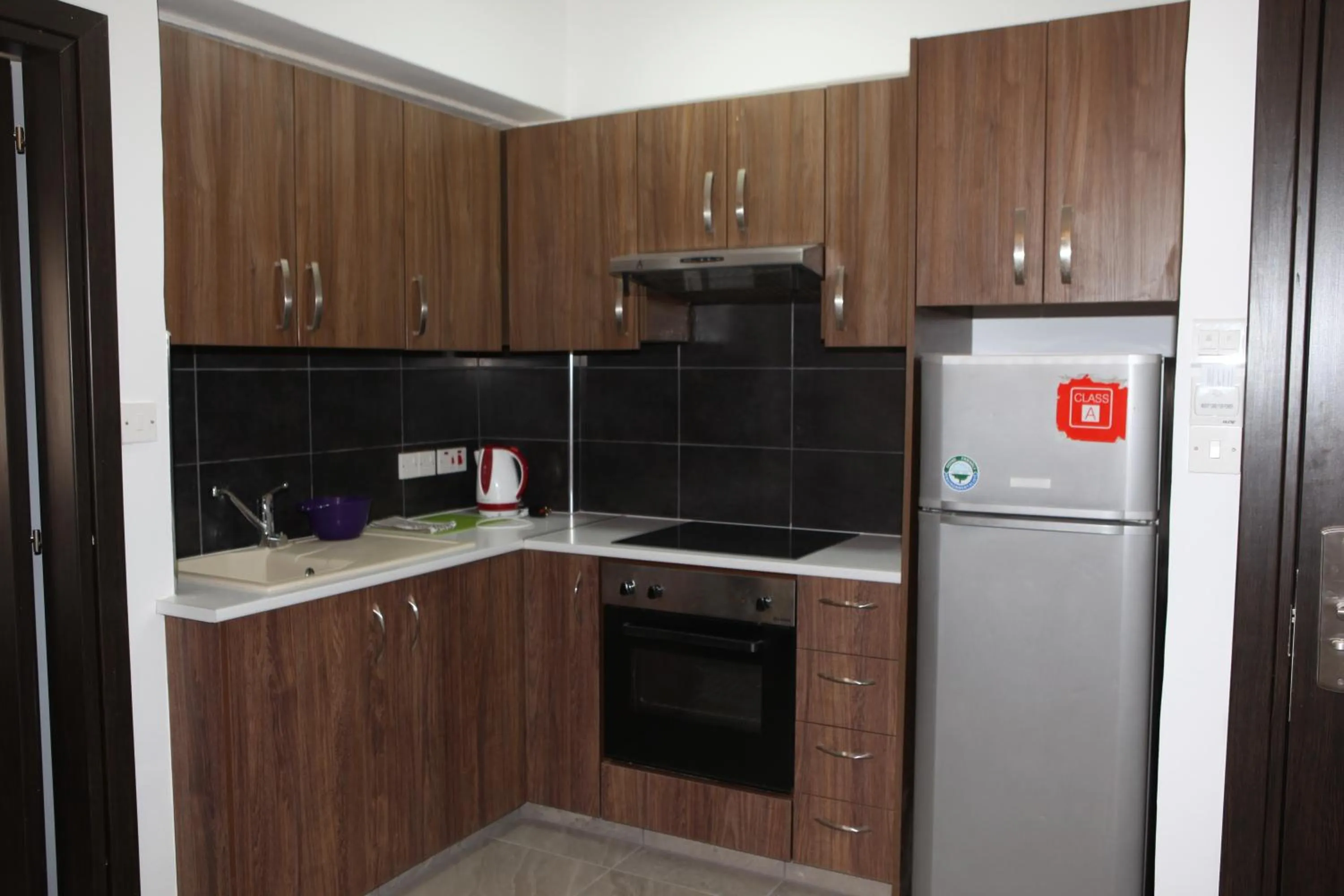 Kitchen or kitchenette in Polyxeni Hotel Apartments