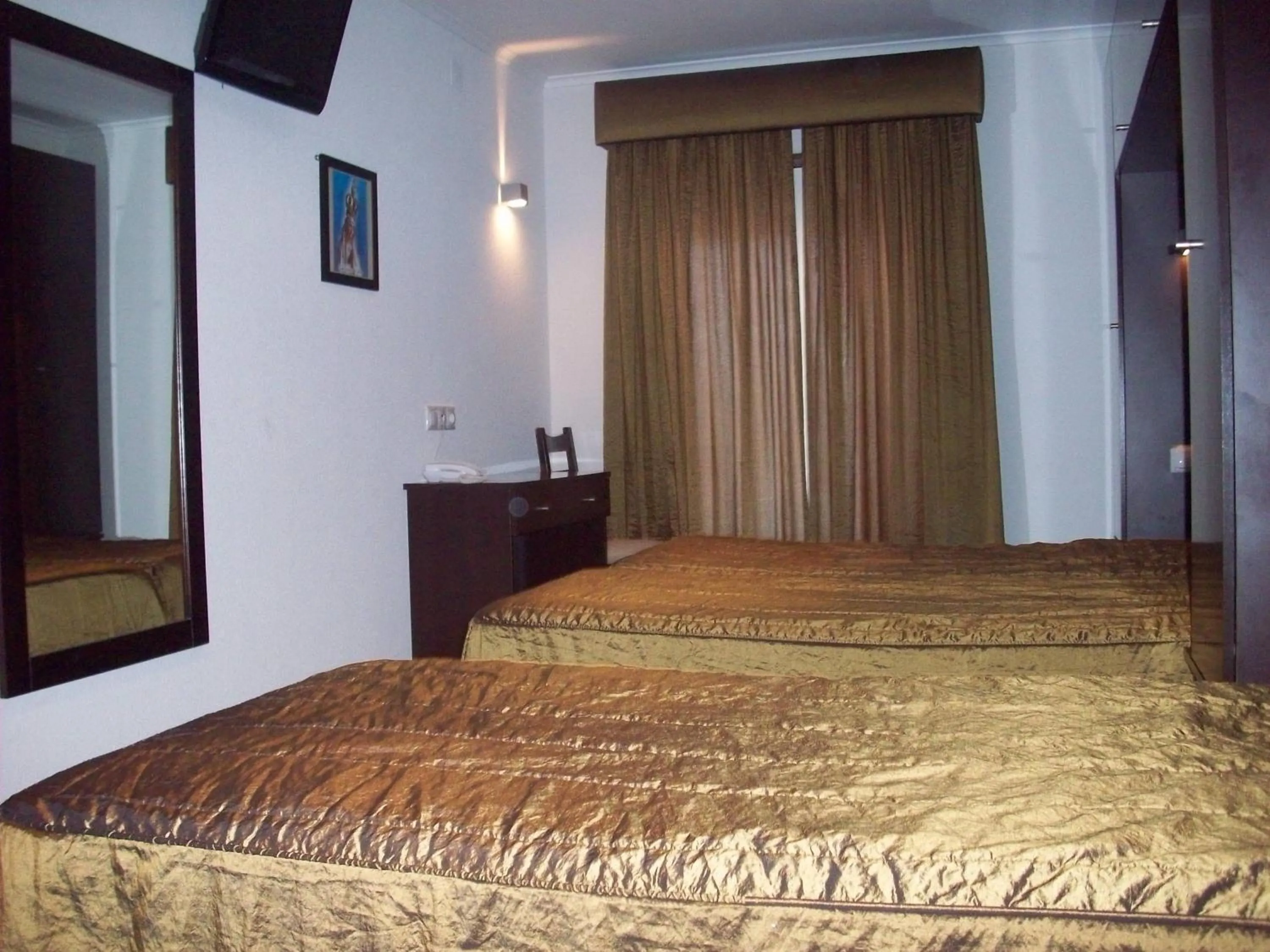 Bed in Residência São Francisco by Umbral