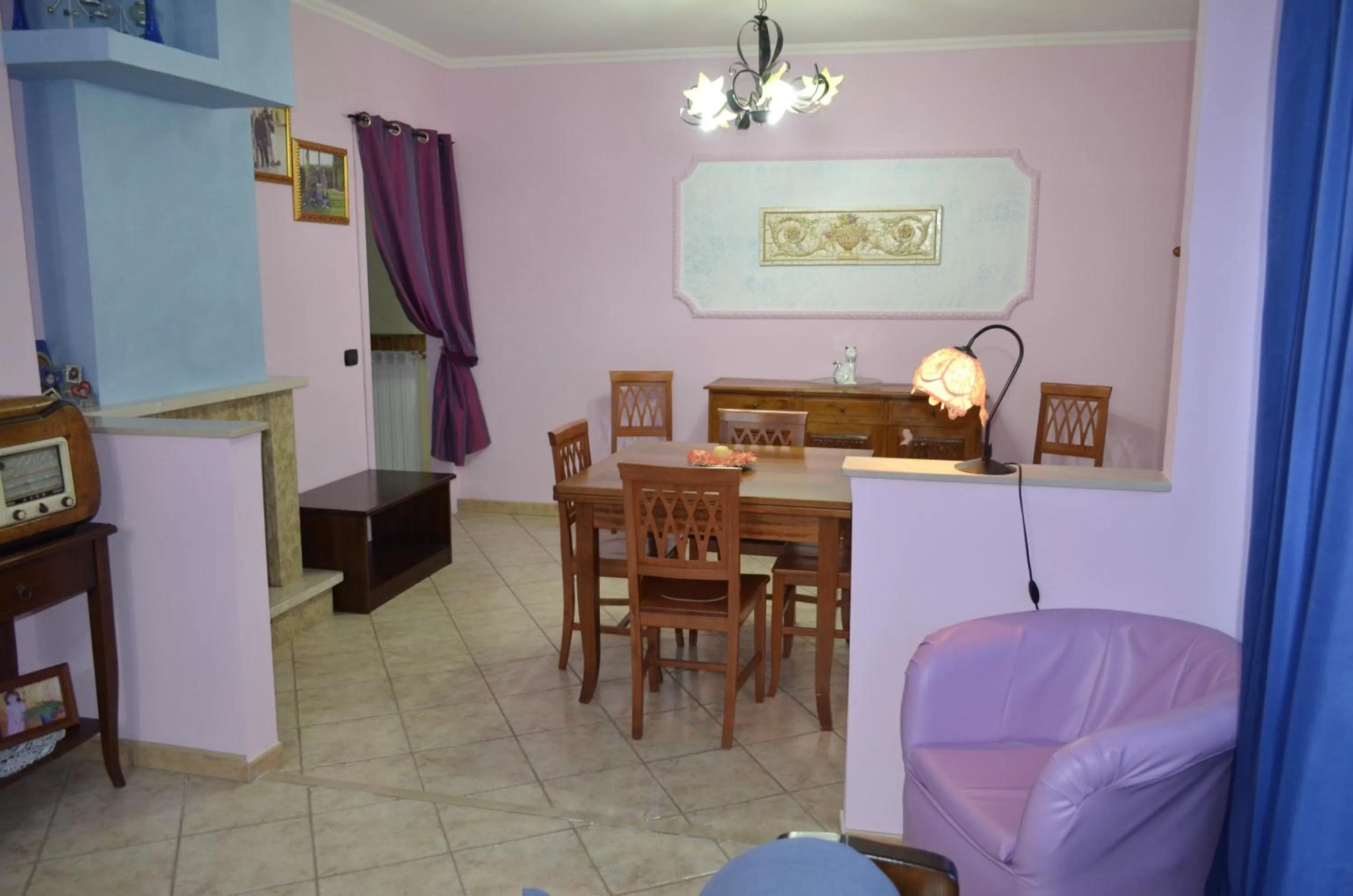 Communal lounge/ TV room in B&B Le Colonne