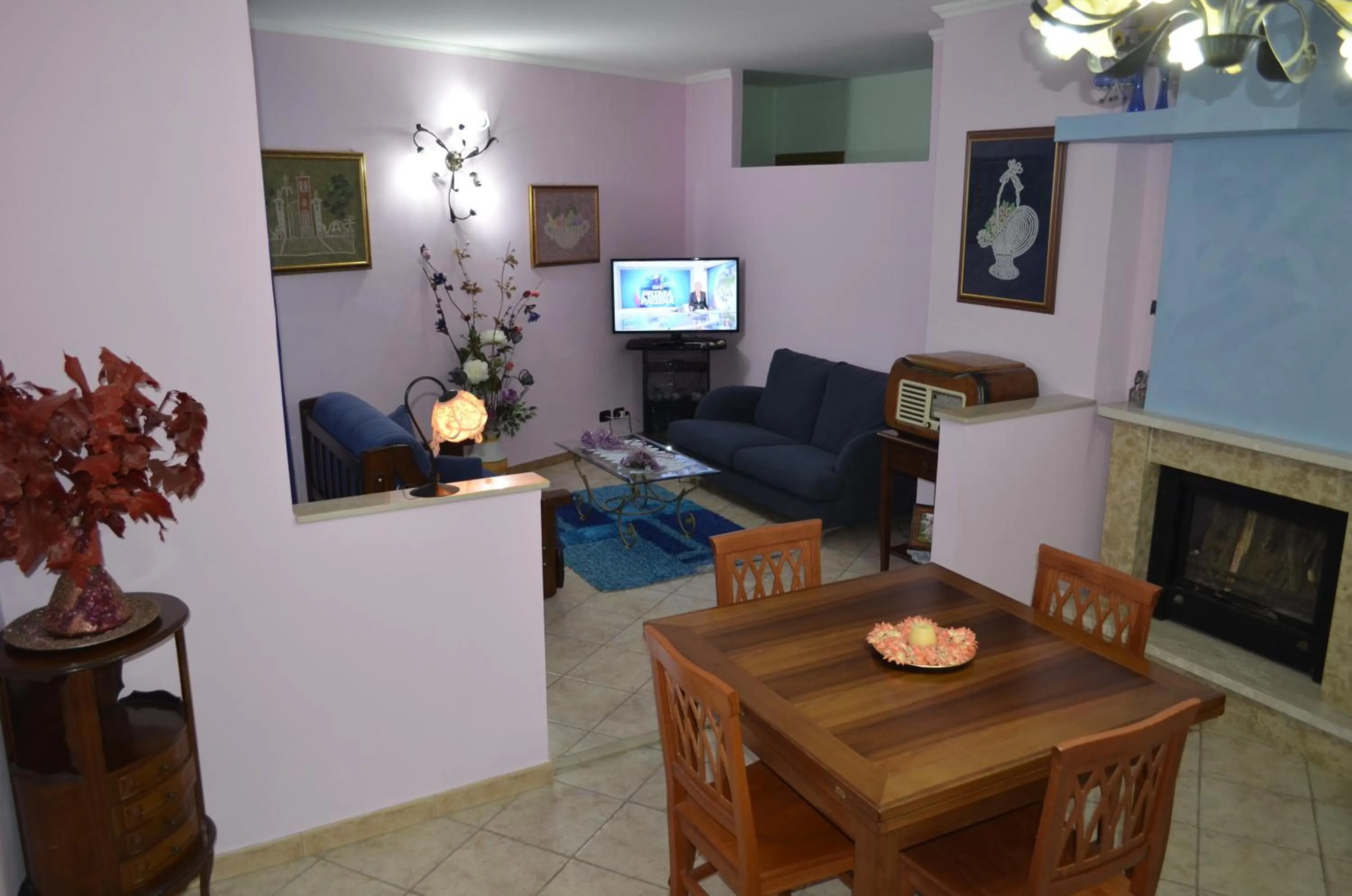 Communal lounge/ TV room in B&B Le Colonne