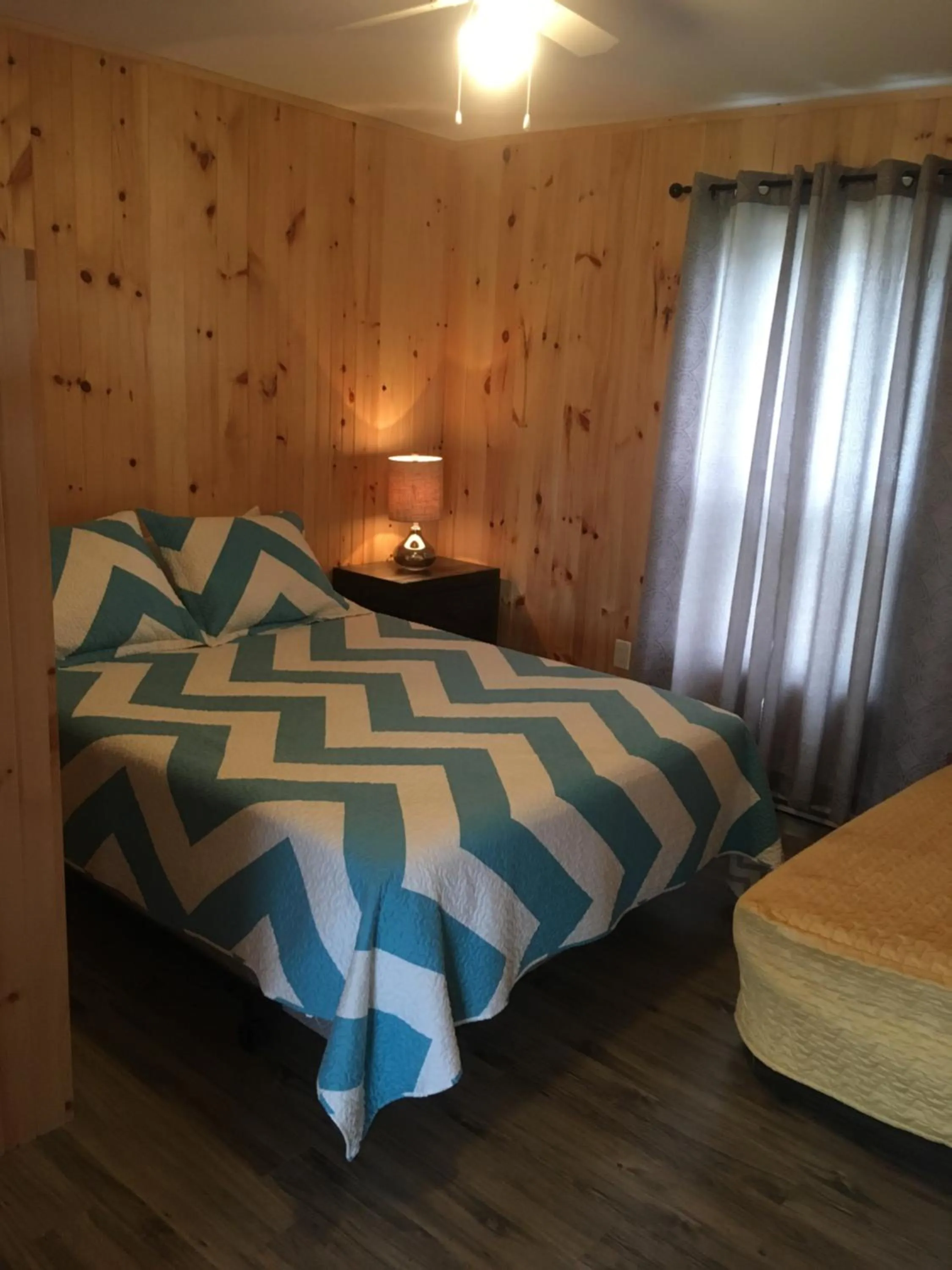 Bedroom, Bed in Baywatch Lighthouse Cottages & Motel