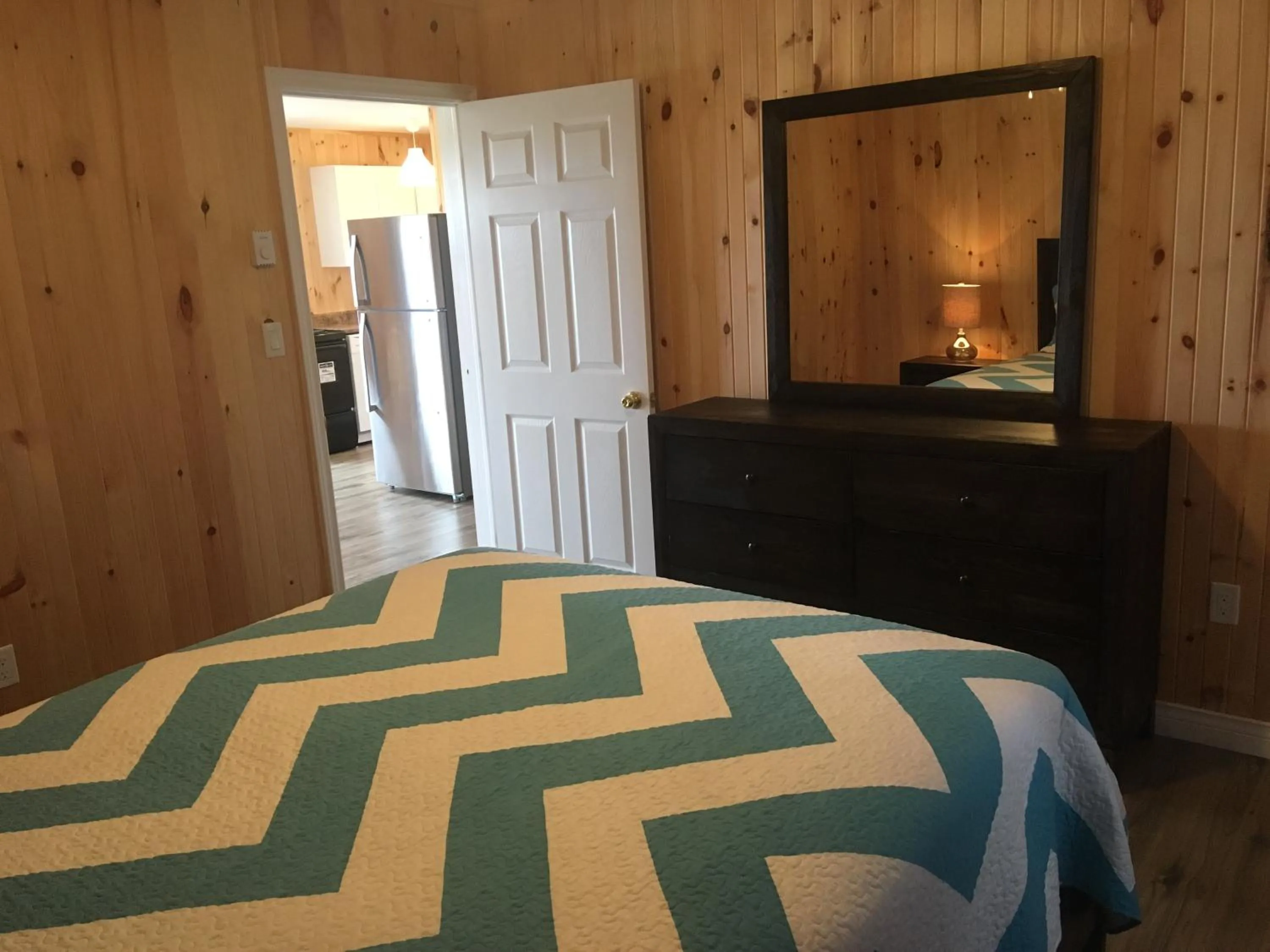 Bed in Baywatch Lighthouse Cottages & Motel