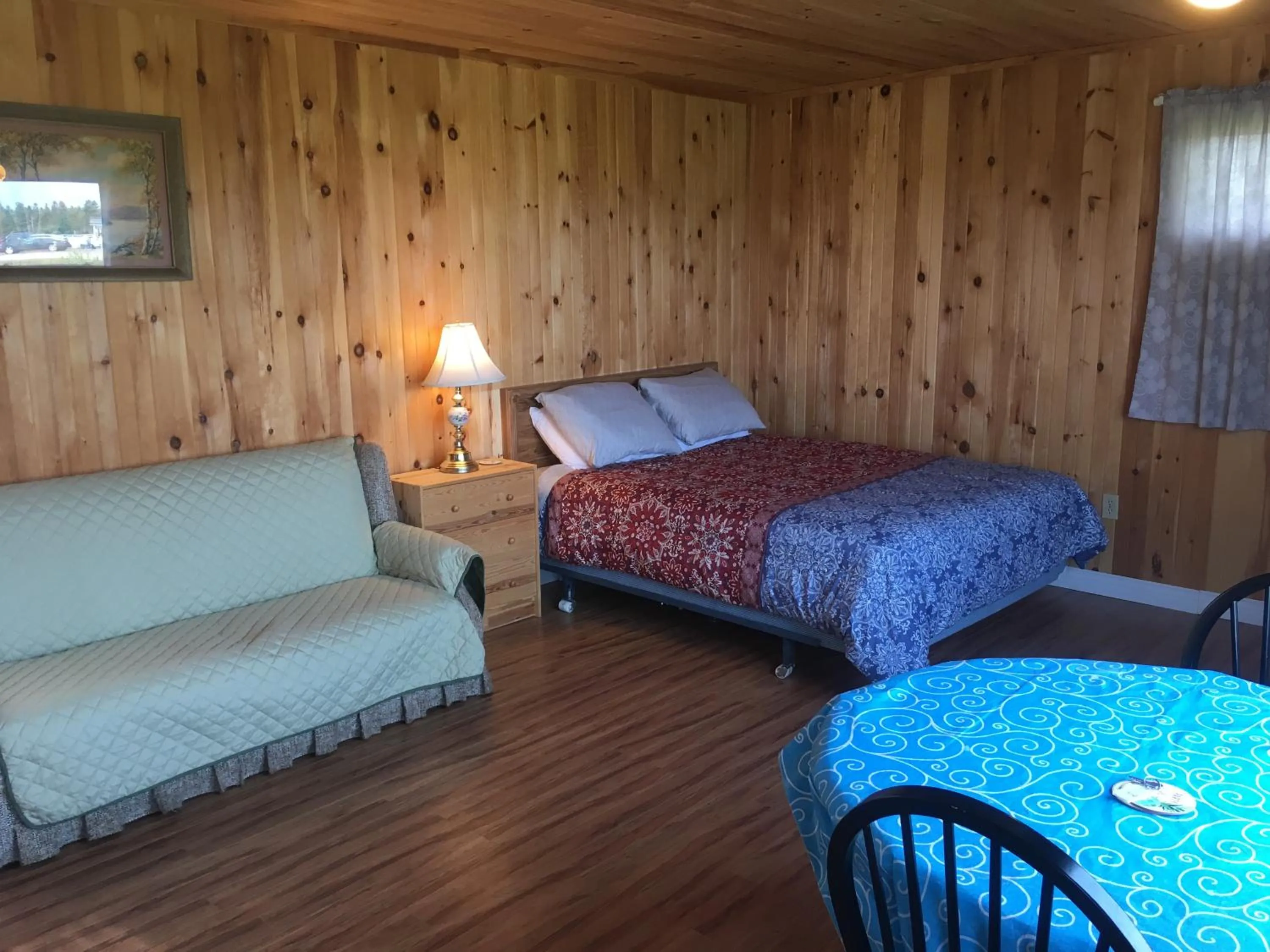 Bed in Baywatch Lighthouse Cottages & Motel