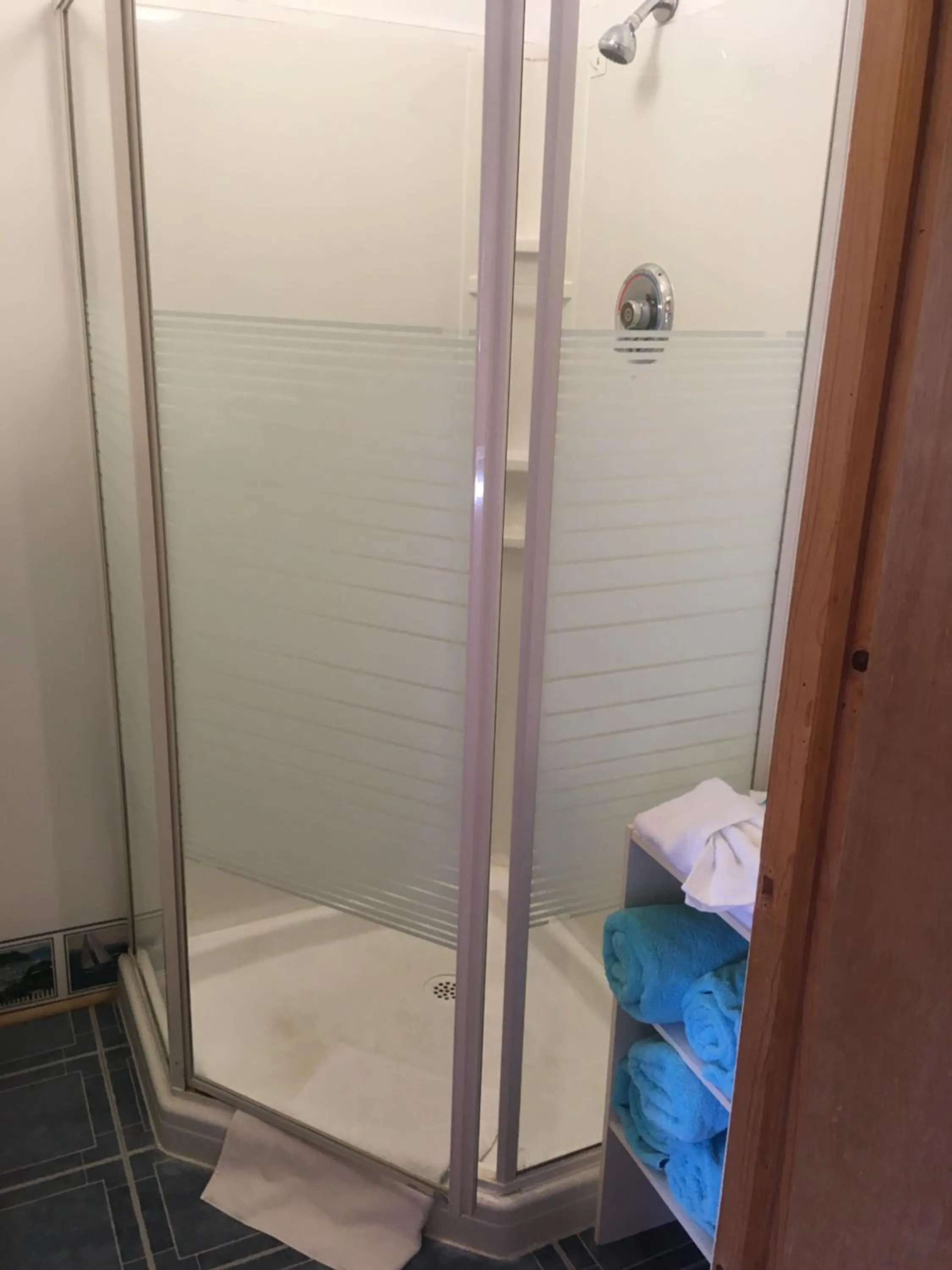 Shower in Baywatch Lighthouse Cottages & Motel
