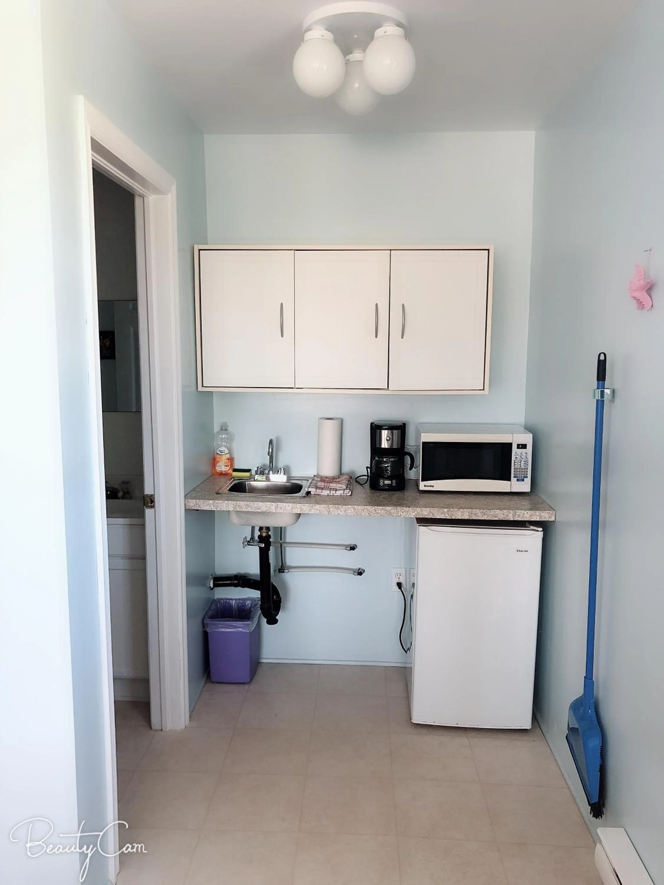 Kitchen or kitchenette in Baywatch Lighthouse Cottages & Motel