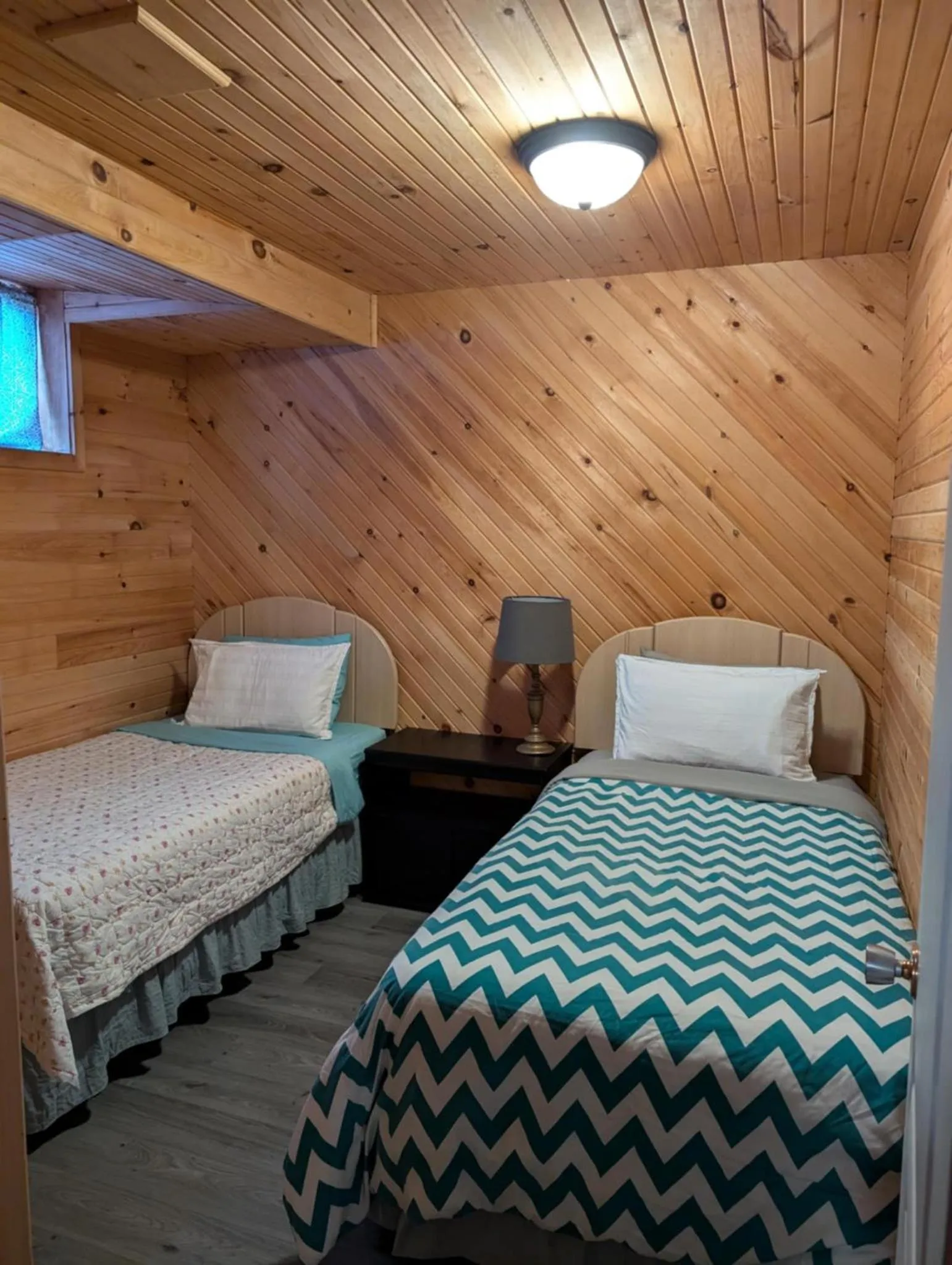 Bed in Baywatch Lighthouse Cottages & Motel