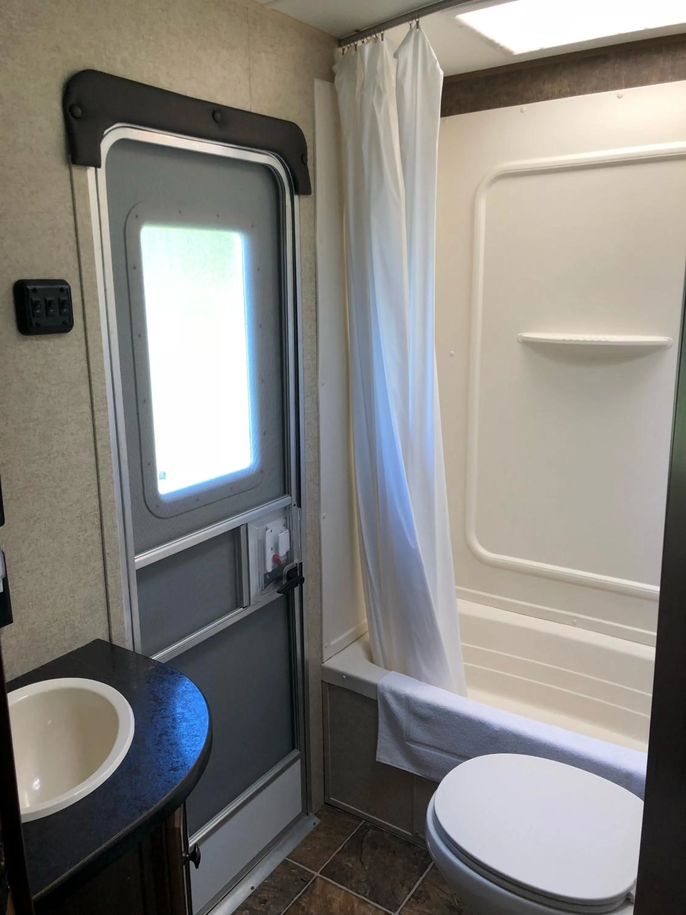 Shower in Baywatch Lighthouse Cottages & Motel