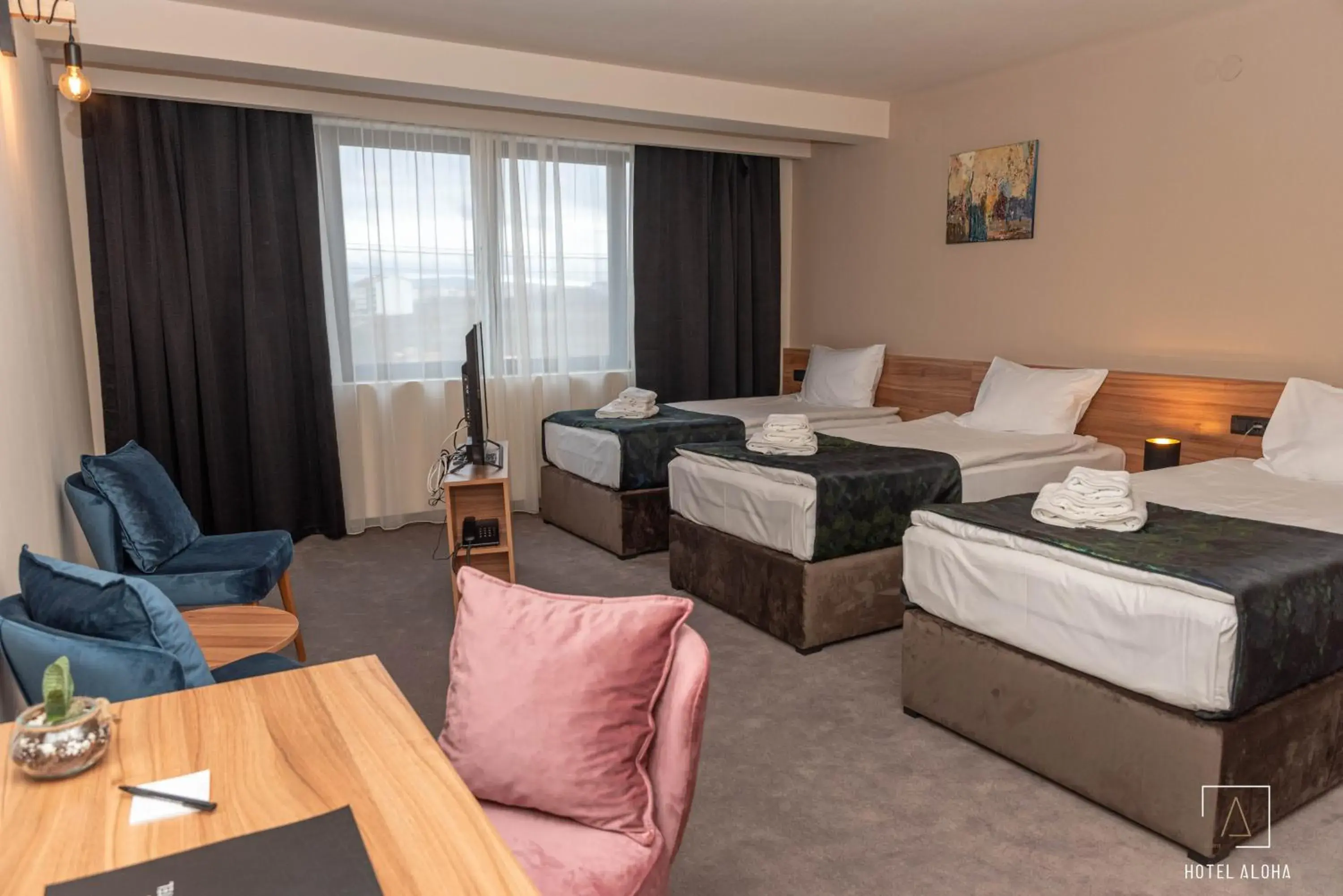 Deluxe Triple Room in Hotel Aloha Deluxe Triple Room in Hotel Aloha