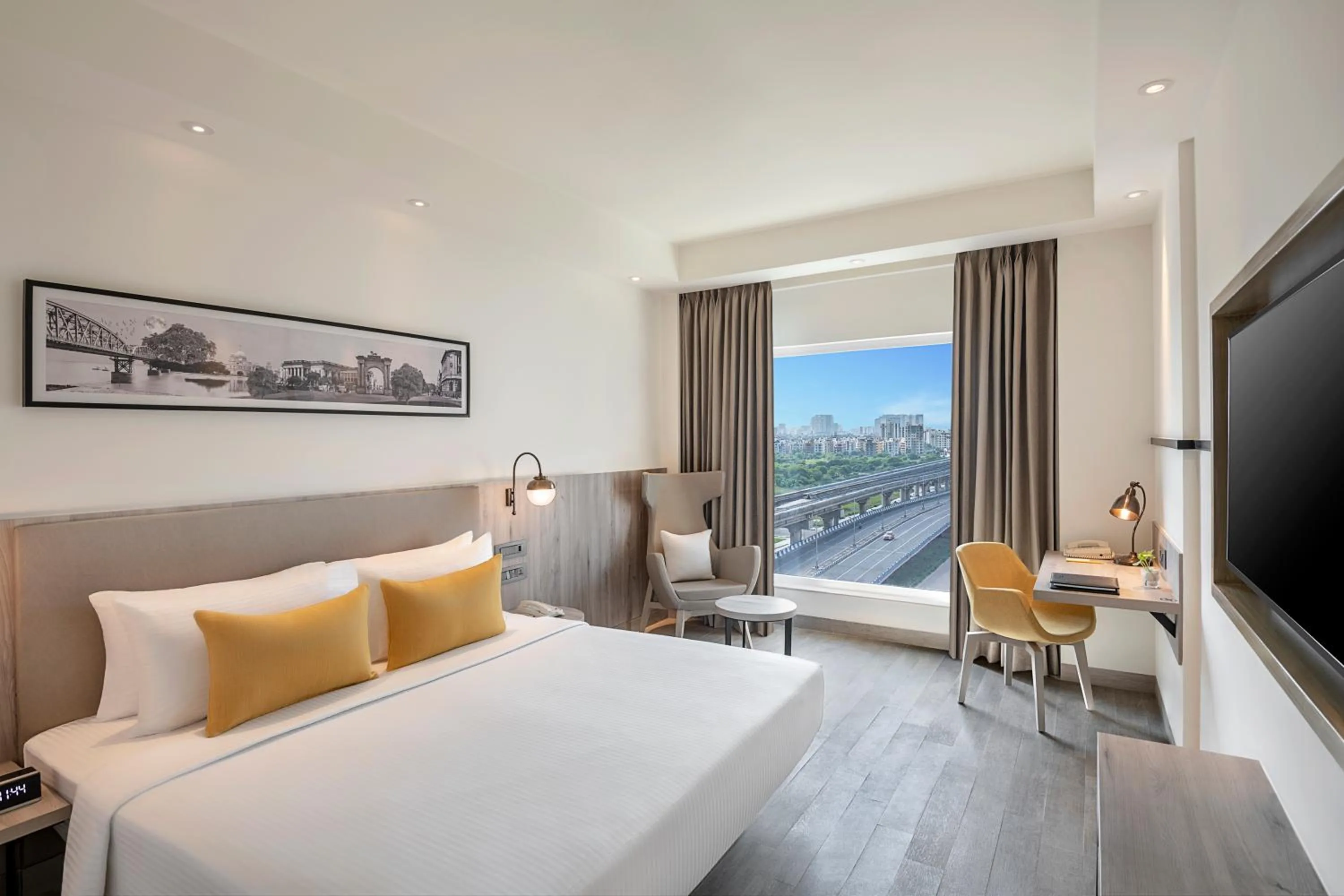 Photo of the whole room, Bed in Lemon Tree Premier, New Town, Kolkata