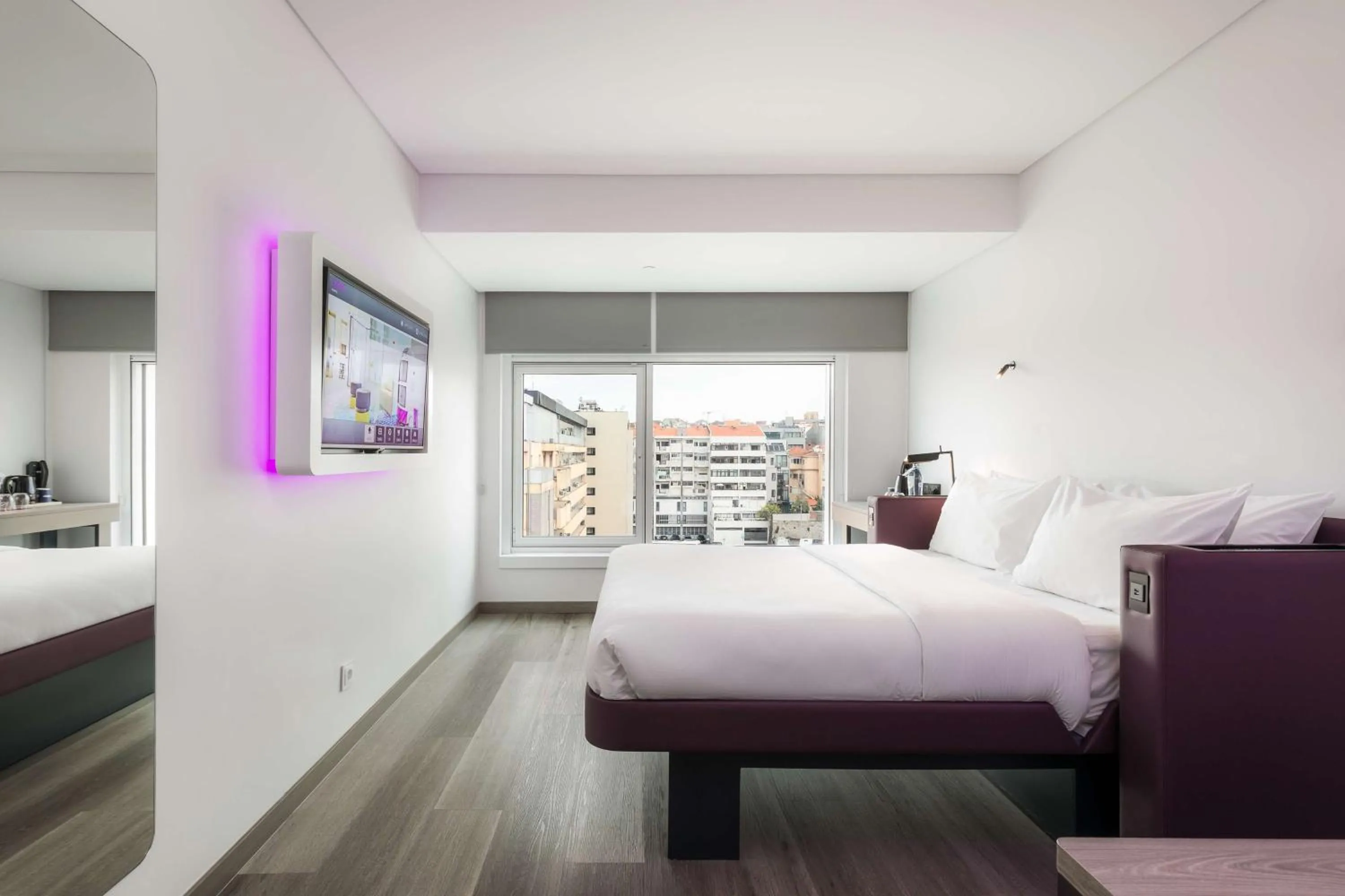 View (from property/room), Bed in YOTEL Porto