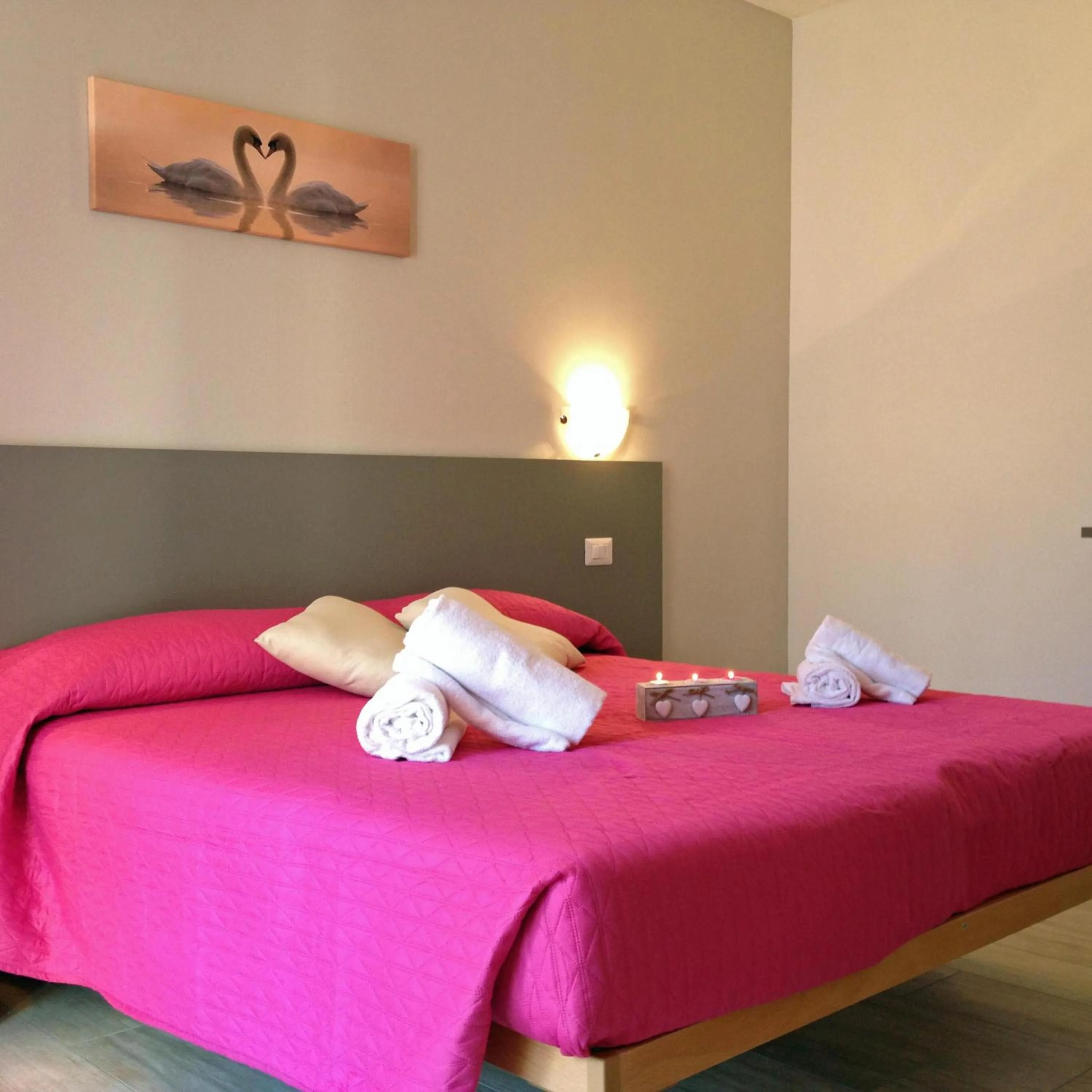 Bedroom in La Collinetta Apartments