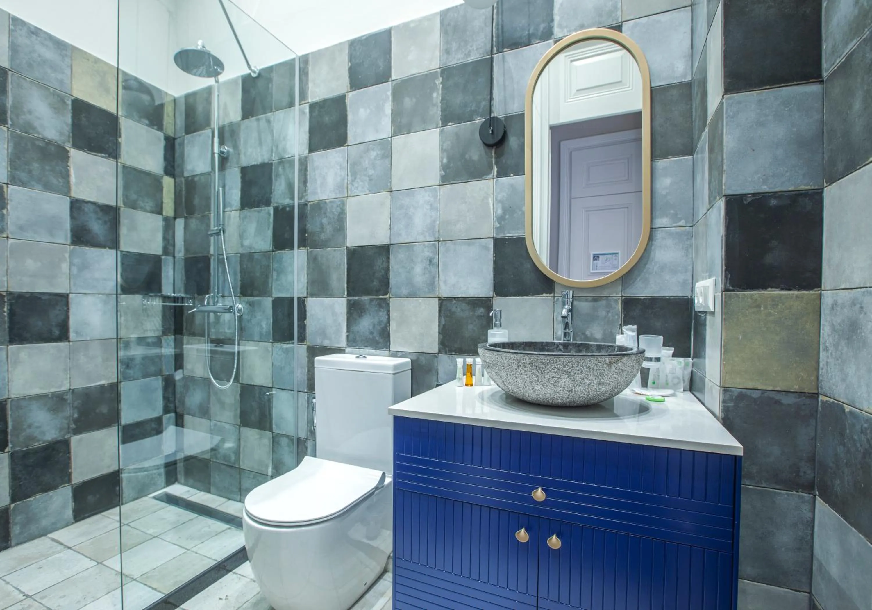 Bathroom in Heritage Hotel and Suites