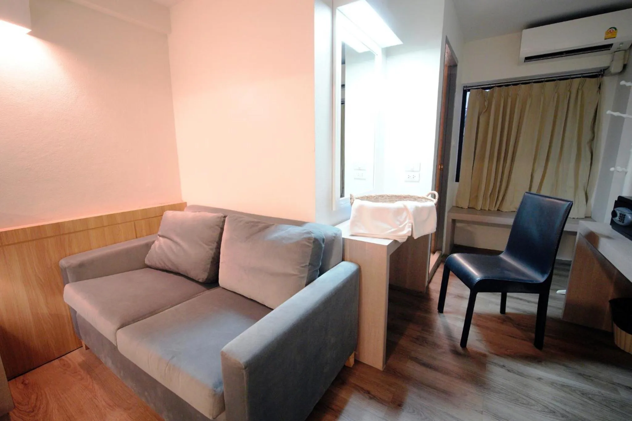 Seating area in Wild Orchid Villa Bangkok