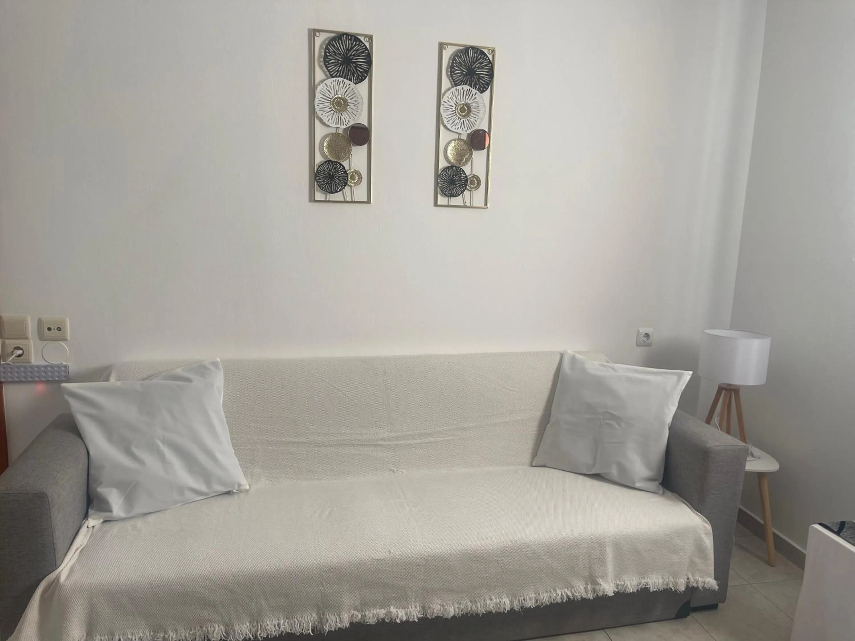 Seating area, Bed in Heaven Studios & Apartments