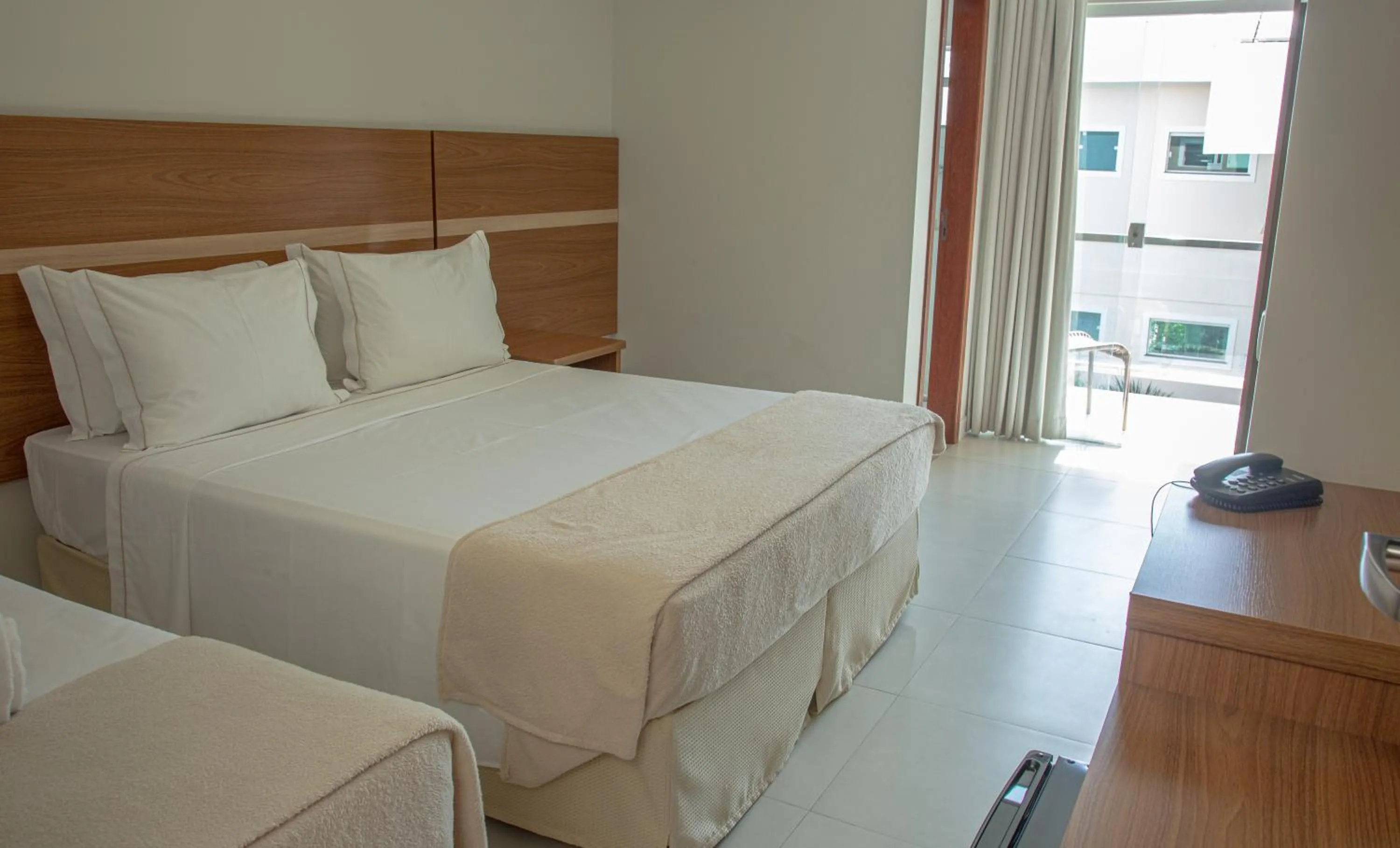 Bed in Orquídeas Praia Hotel