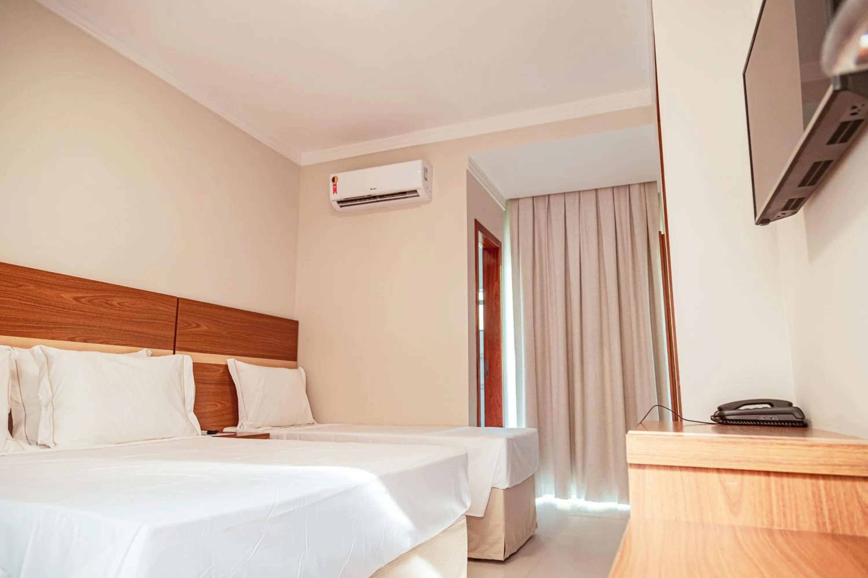 Bed in Orquídeas Praia Hotel