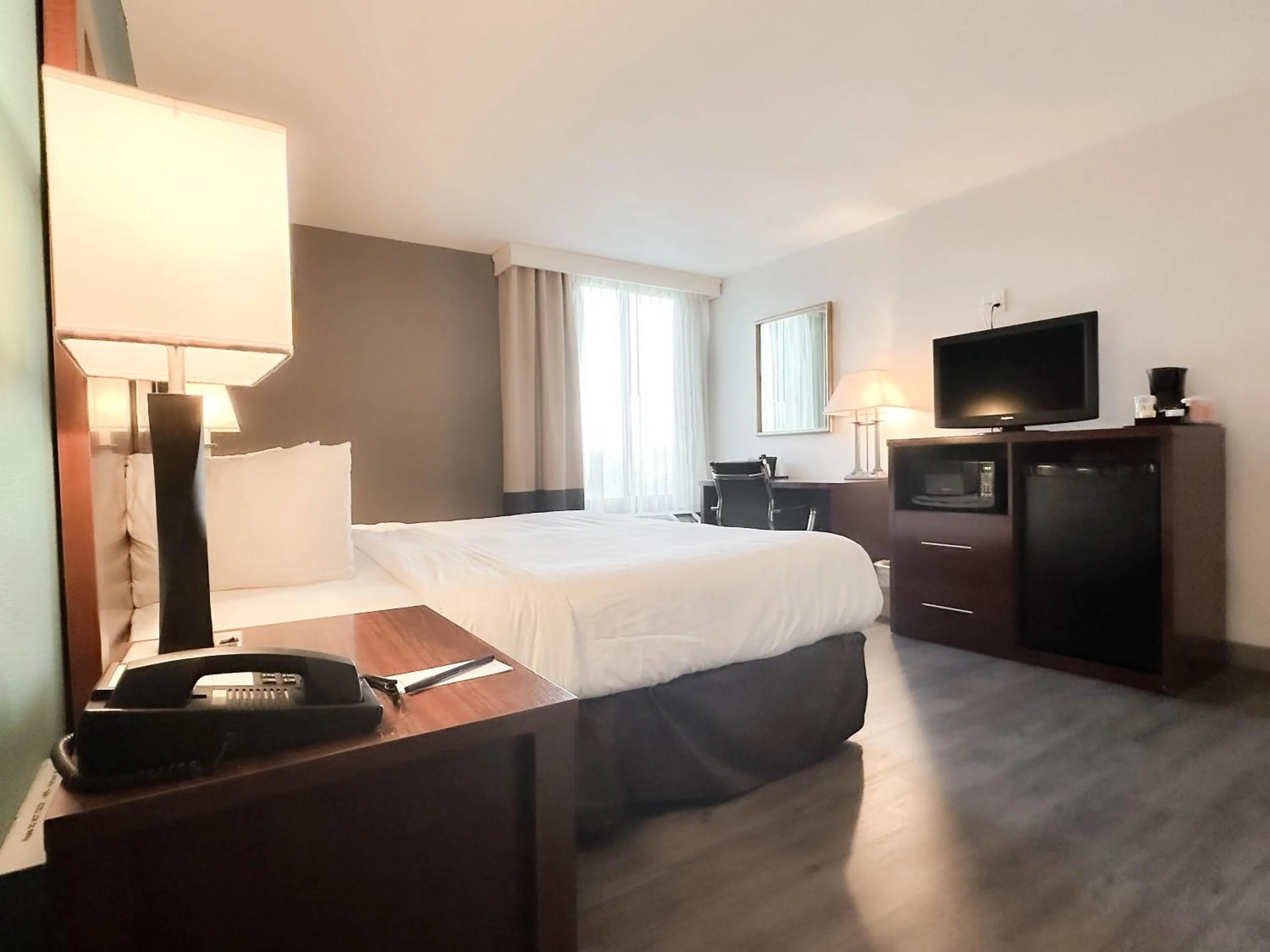 Bed in Comfort Inn & Suites Kissimmee by the Parks