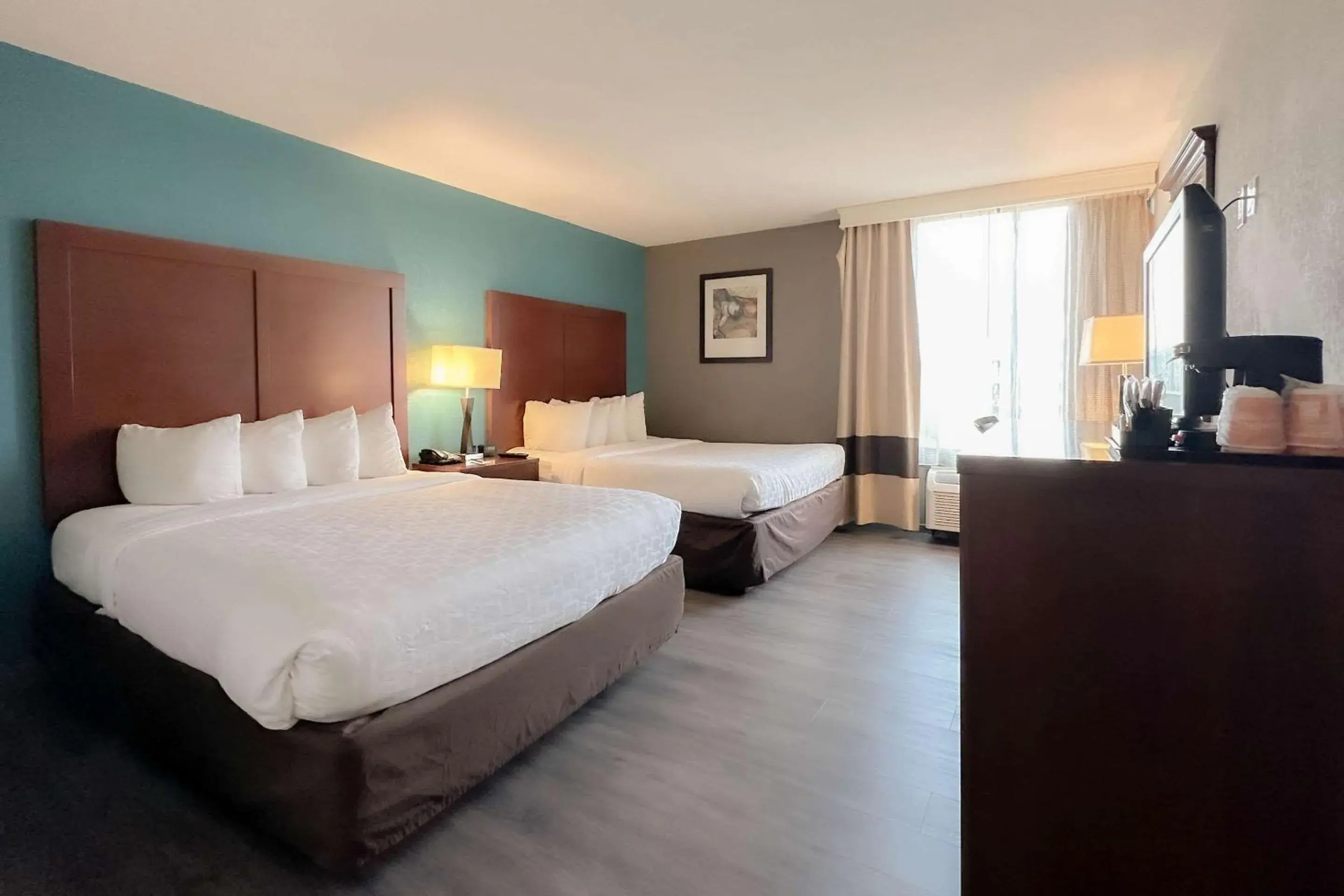 Deluxe Queen Room with Two Queen Beds with Sofa Bed in Comfort Inn & Suites Kissimmee by the Parks Deluxe Queen Room with Two Queen Beds with Sofa Bed in Comfort Inn & Suites Kissimmee by the Parks