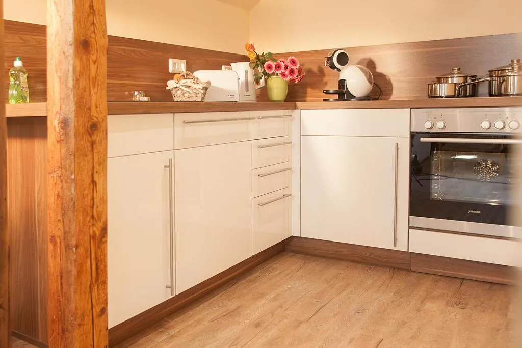 Kitchen or kitchenette in City-Appartements Am Wall