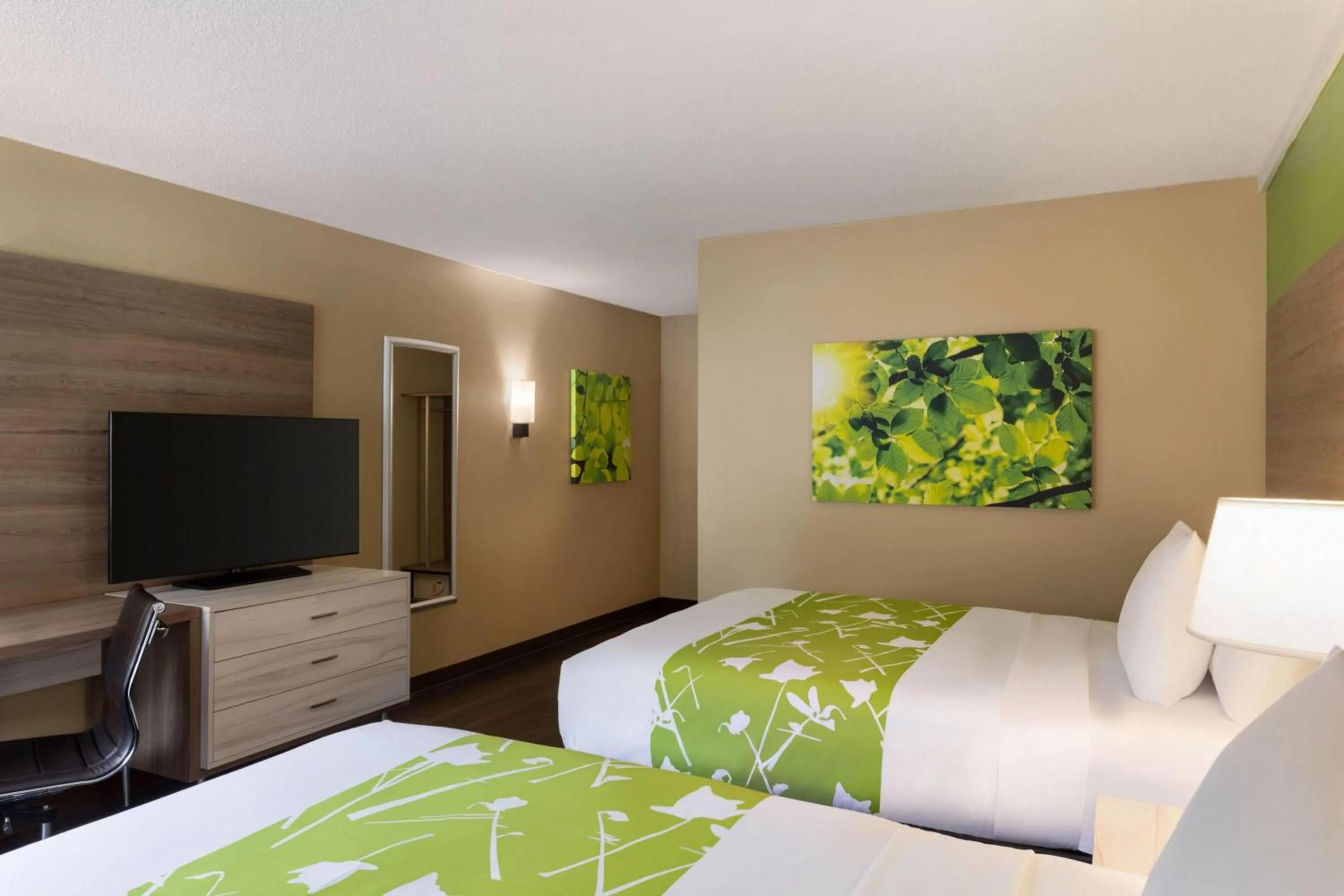 Photo of the whole room, Bed in Wyndham Garden Washington DC North